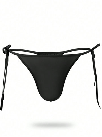 Men's plain black knitted thong underwear with knot detail and low-rise design