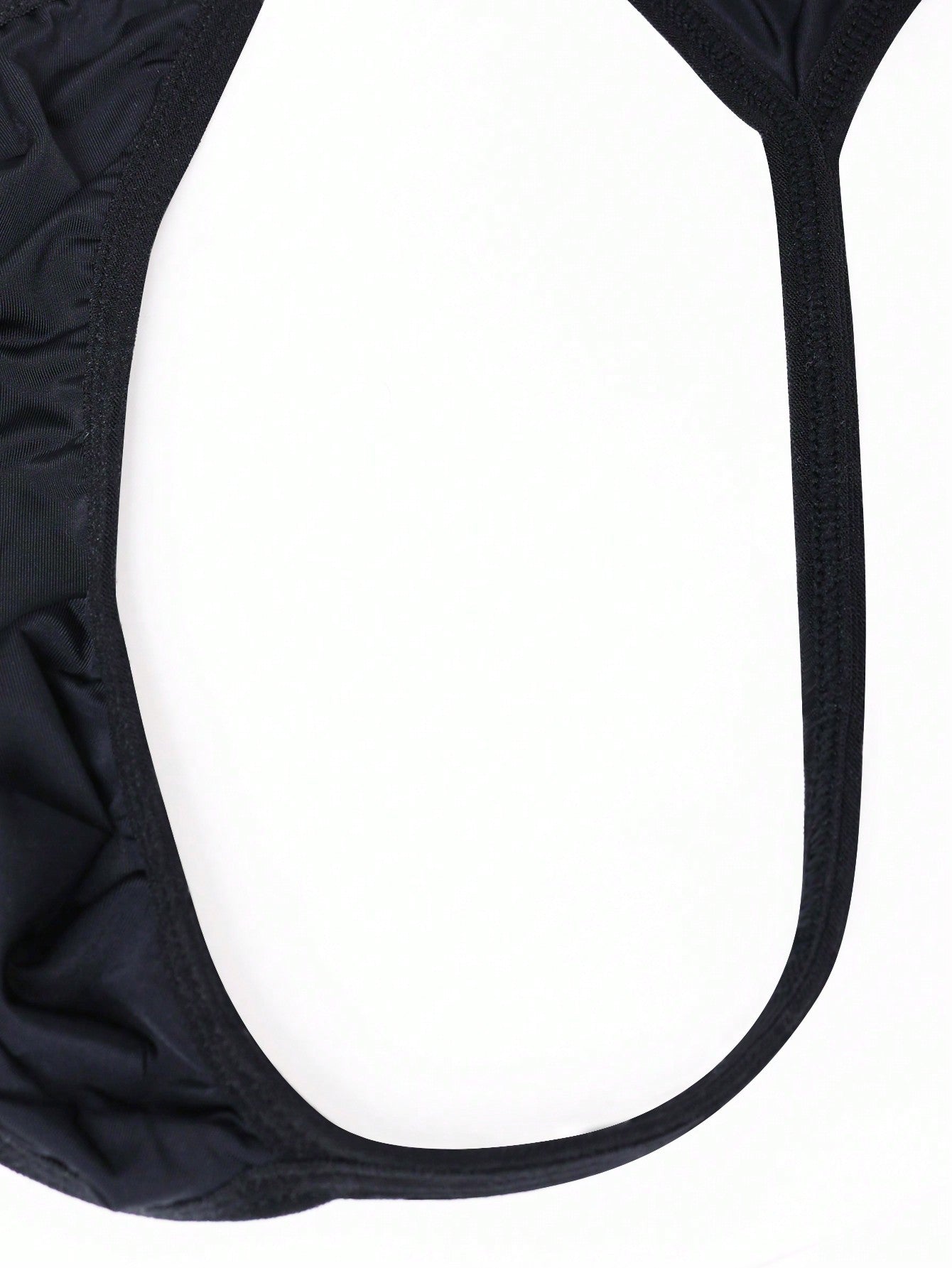 Men's plain black knitted thong underwear with knot detail and low-rise design
