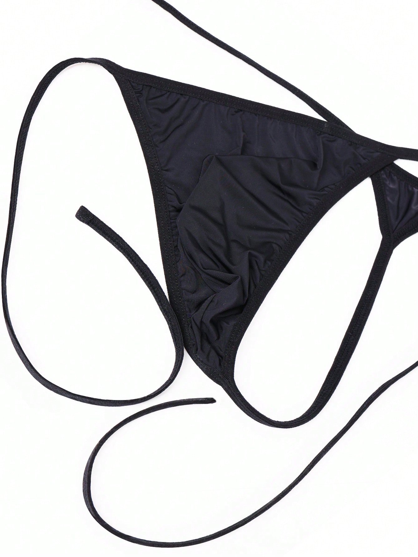 Men's plain black knitted thong underwear with knot detail and low-rise design