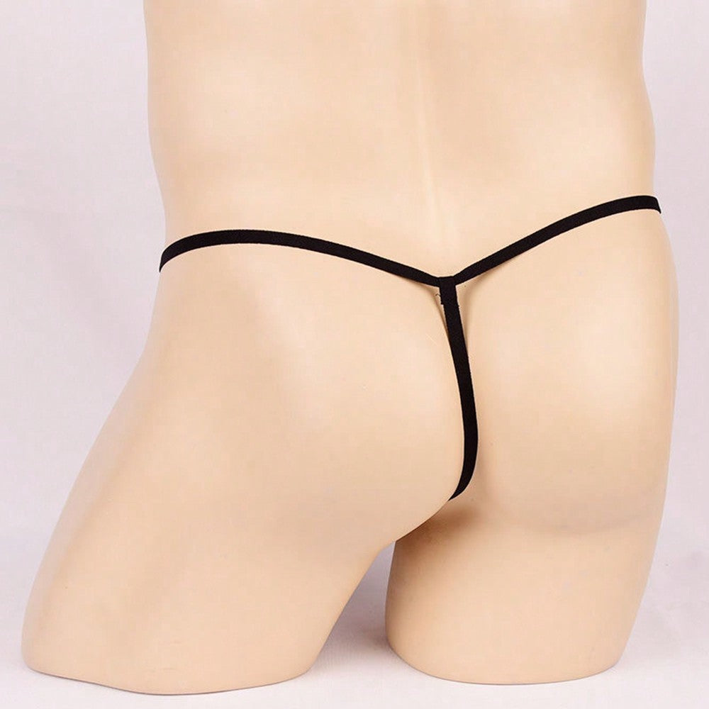 Men's elephant cartoon thong underwear with bow detail, leopard print, mid-rise fit, and semi-sheer fabric for novelty cosplay, party, festival, or Halloween wear.