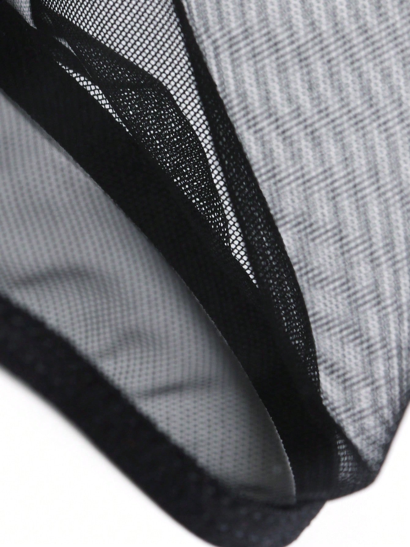 Men's black mesh triangle briefs with mid-rise cut and medium-stretch fabric