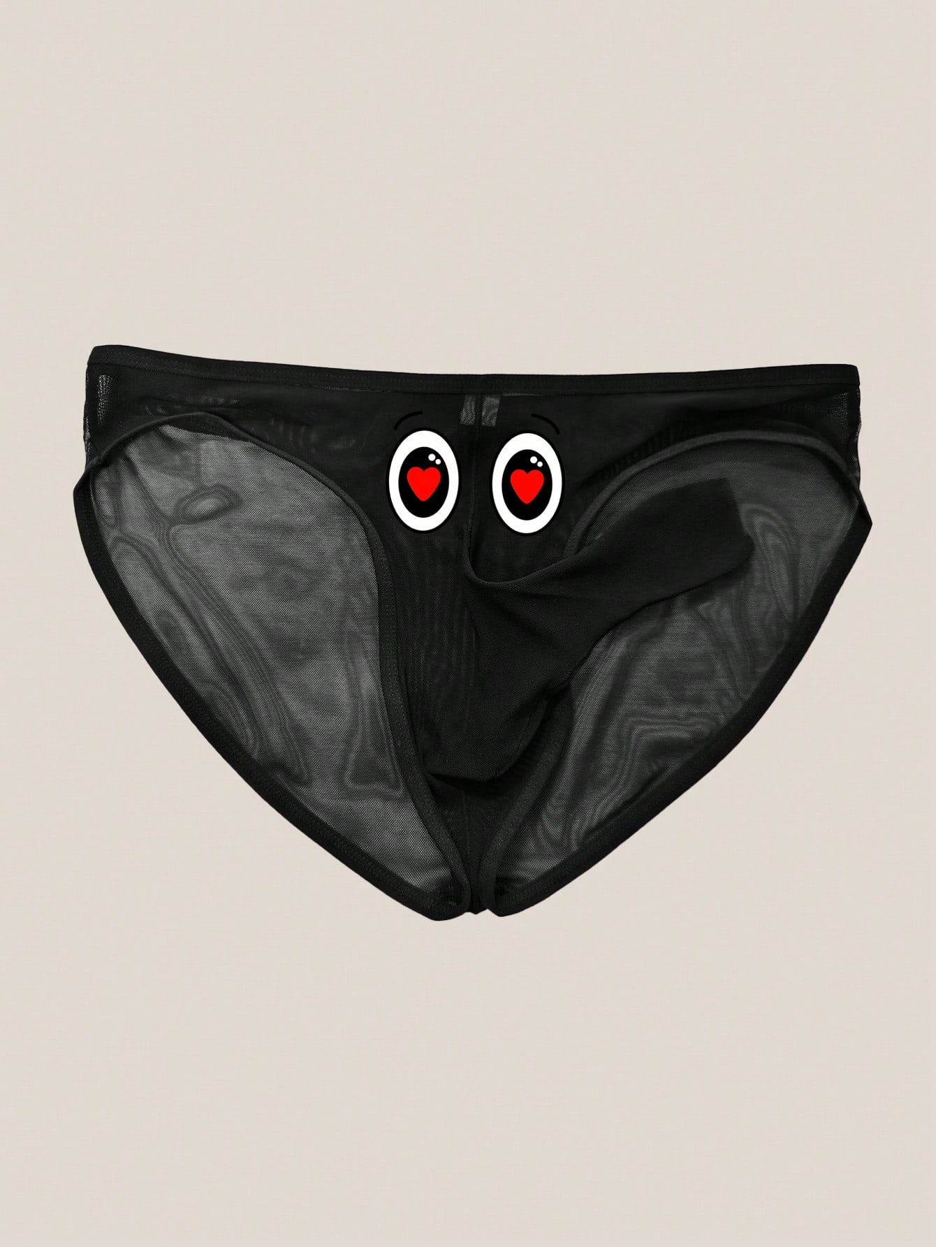 Men's black semi-sheer mesh thong with heart eye print pattern, low-rise cut, and breathable knitted fabric.
