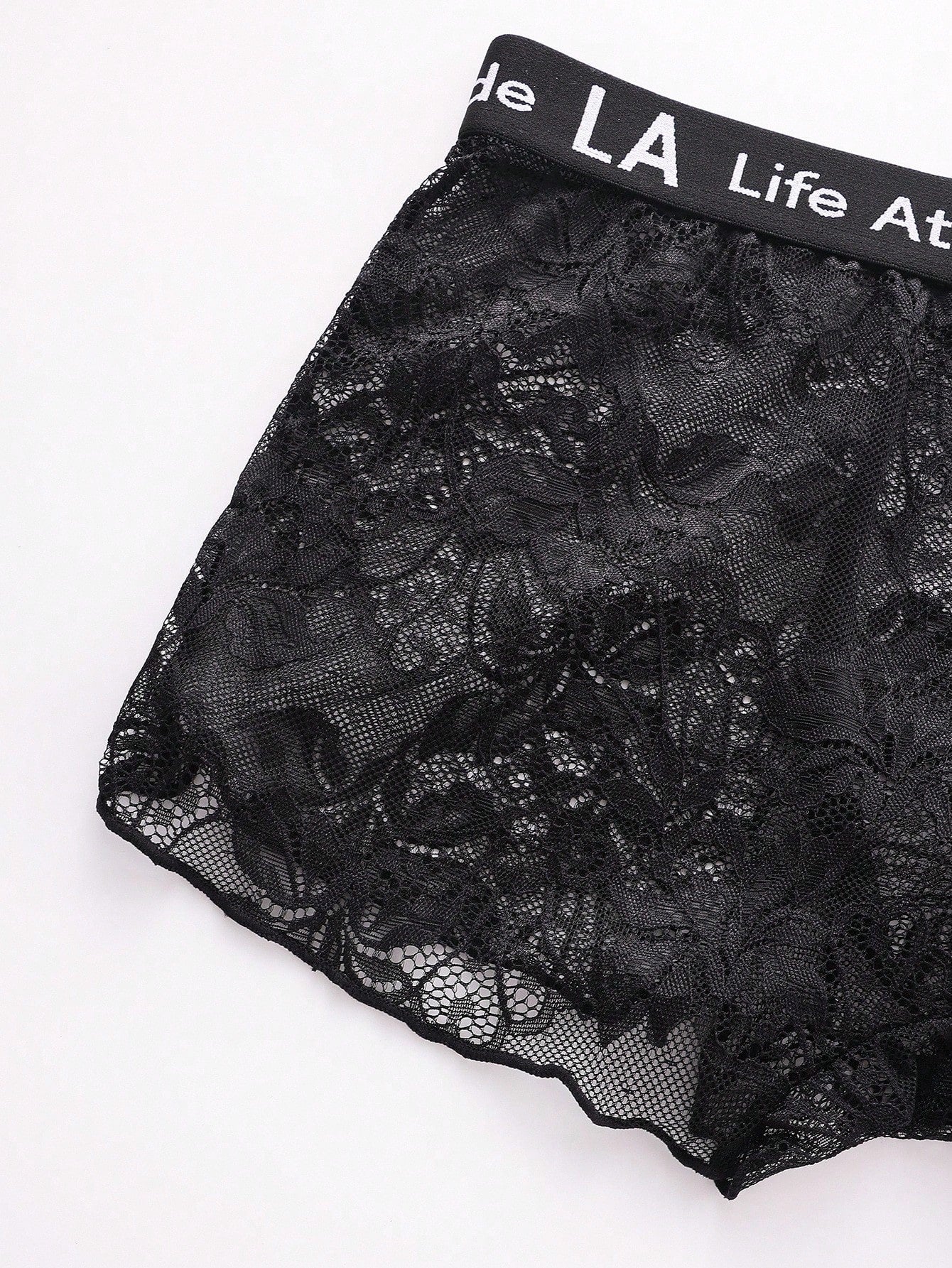 Men's black semi-sheer lace low-rise boxer shorts with a letter waistband and tape detail