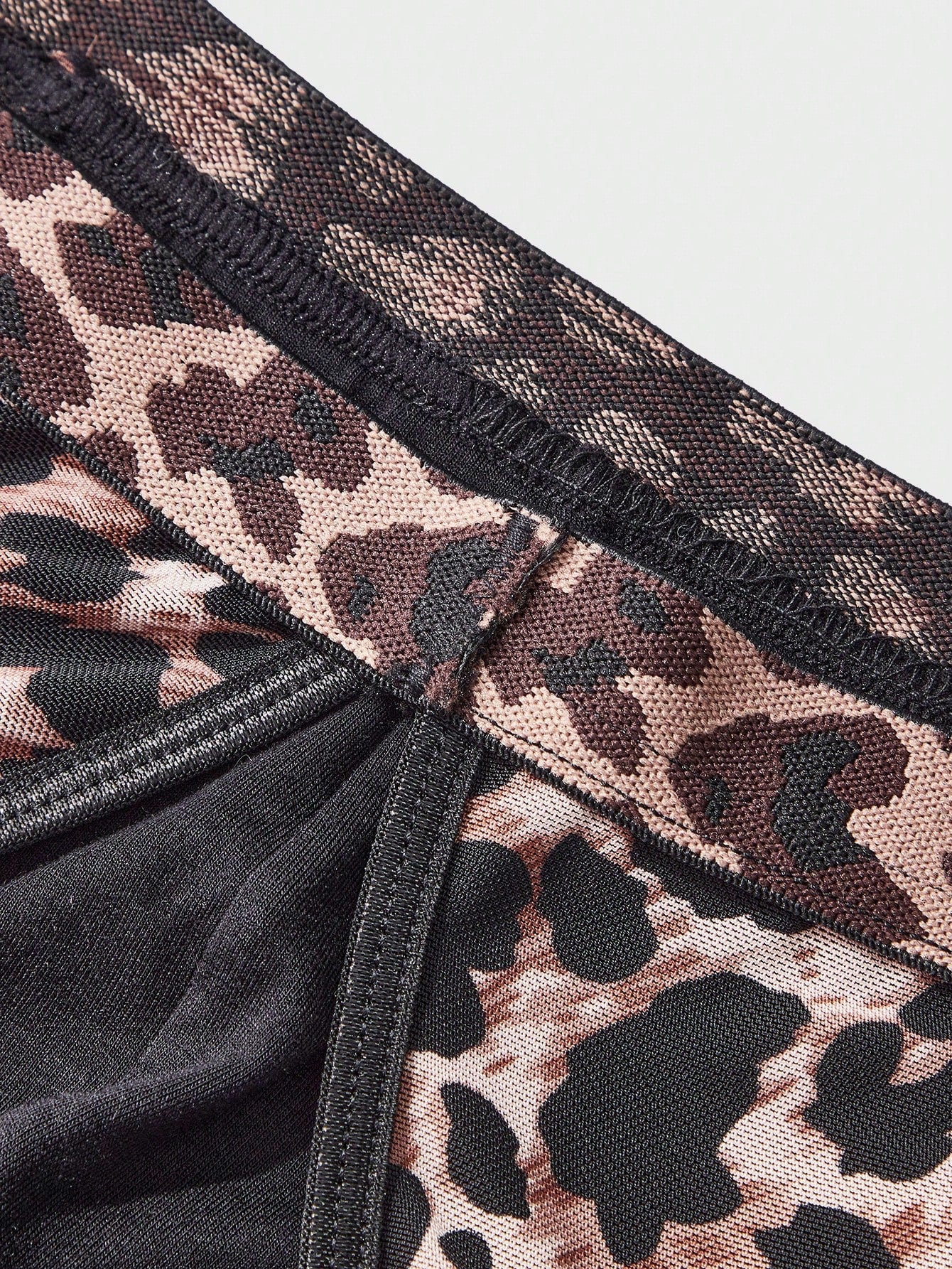 Men's brown leopard print mesh patchwork low rise briefs with leopard woven tape detail