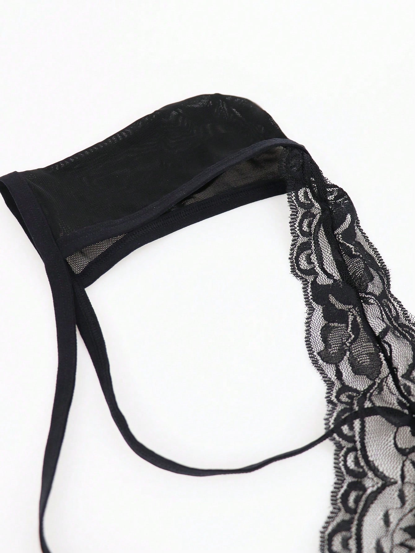 Men's black mesh hollow-out thong underwear with lace trim waist and low-rise brief styling