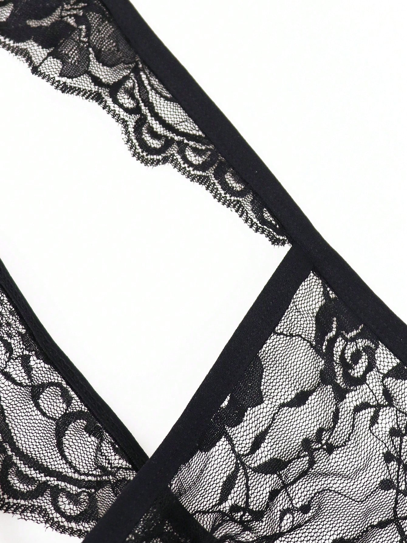 Men's low-rise mesh thong underwear with lace trim and a plain, alluring design