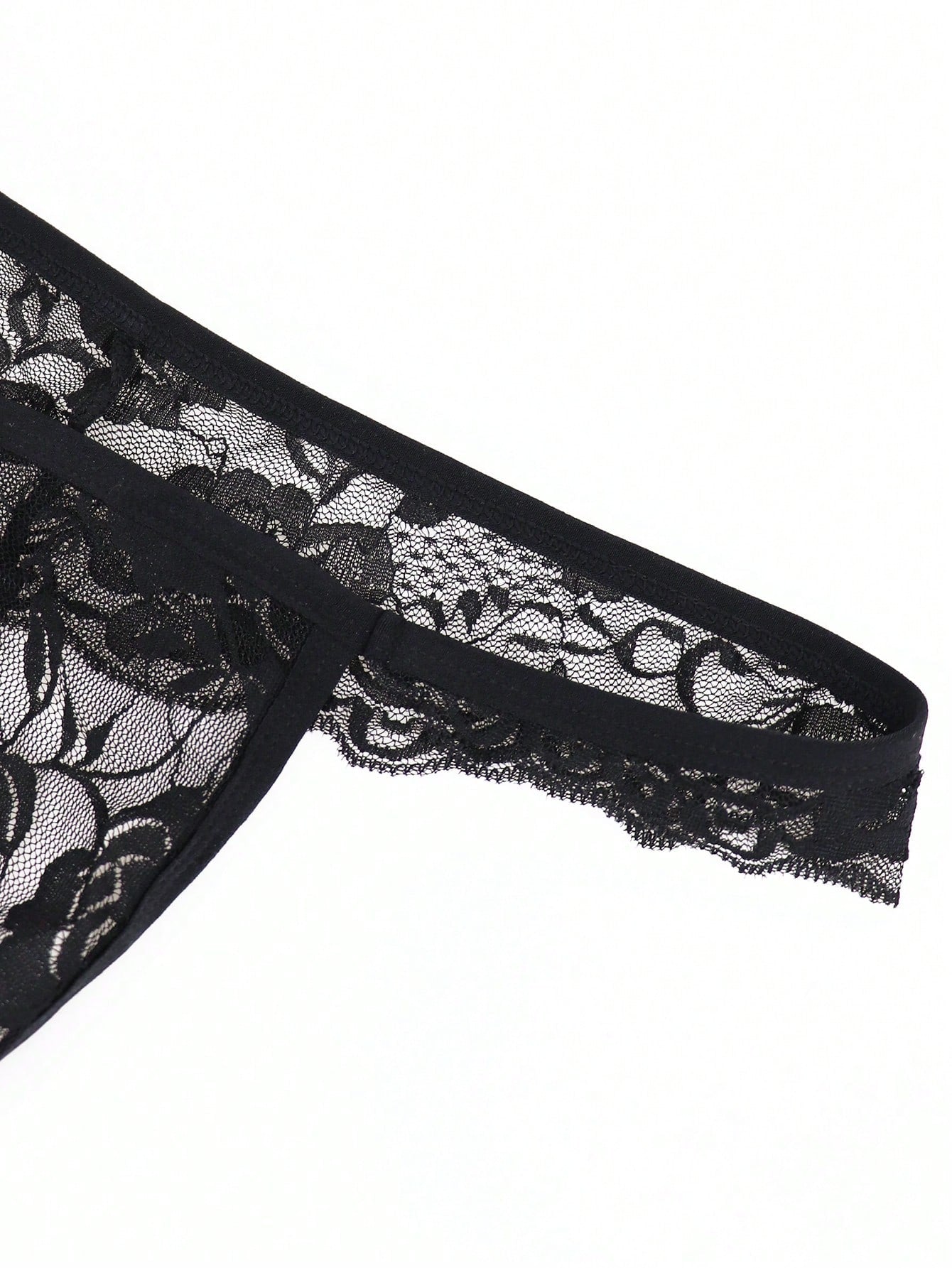 Men's low-rise mesh thong underwear with lace trim and a plain, alluring design