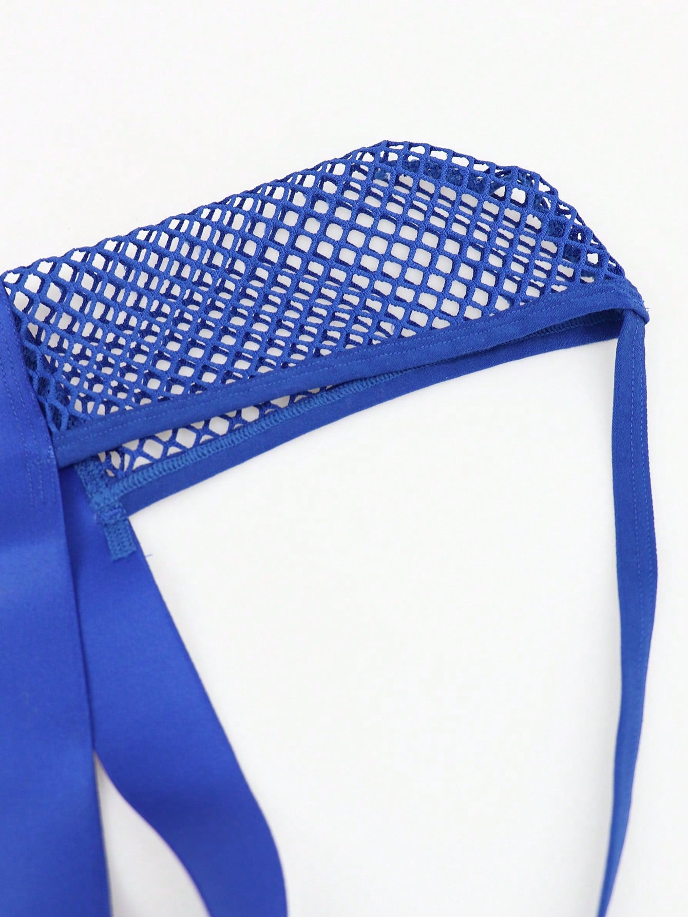 Men's hollow mesh mid-rise thong underwear with a colorblock design