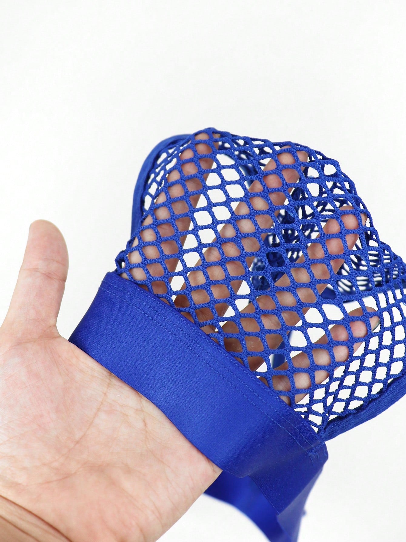 Men's hollow mesh mid-rise thong underwear with a colorblock design