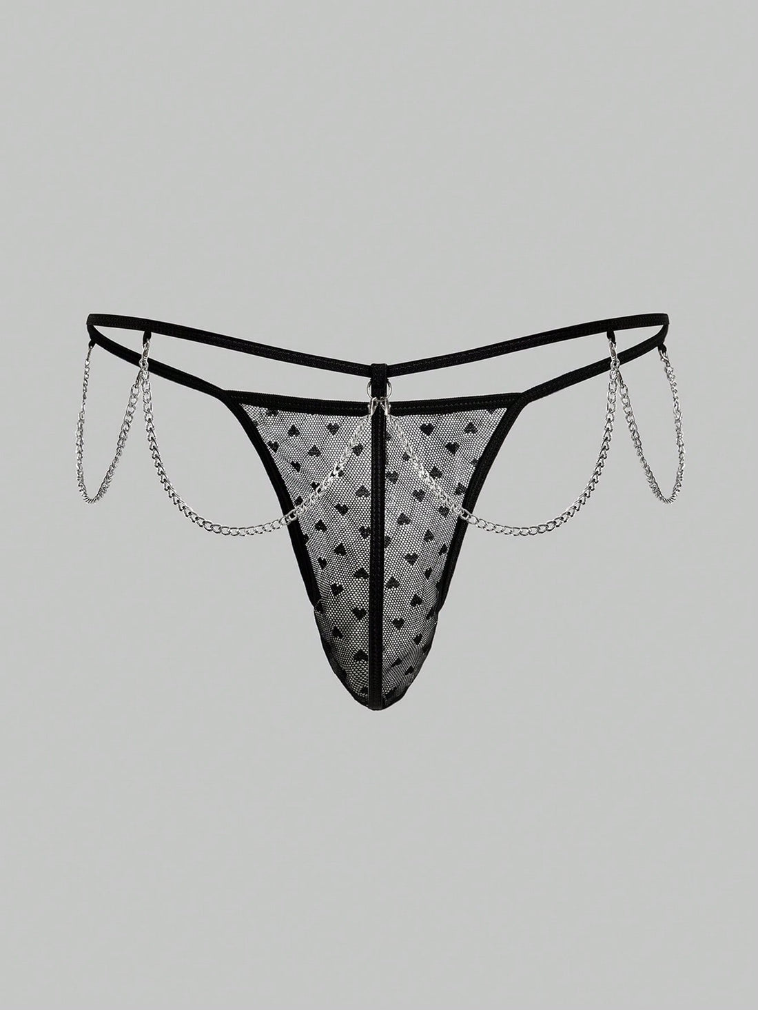 Men's black sheer mesh low-rise thong underwear with heart-shaped hollow-out design, geometric pattern, ring detail, and chain accent