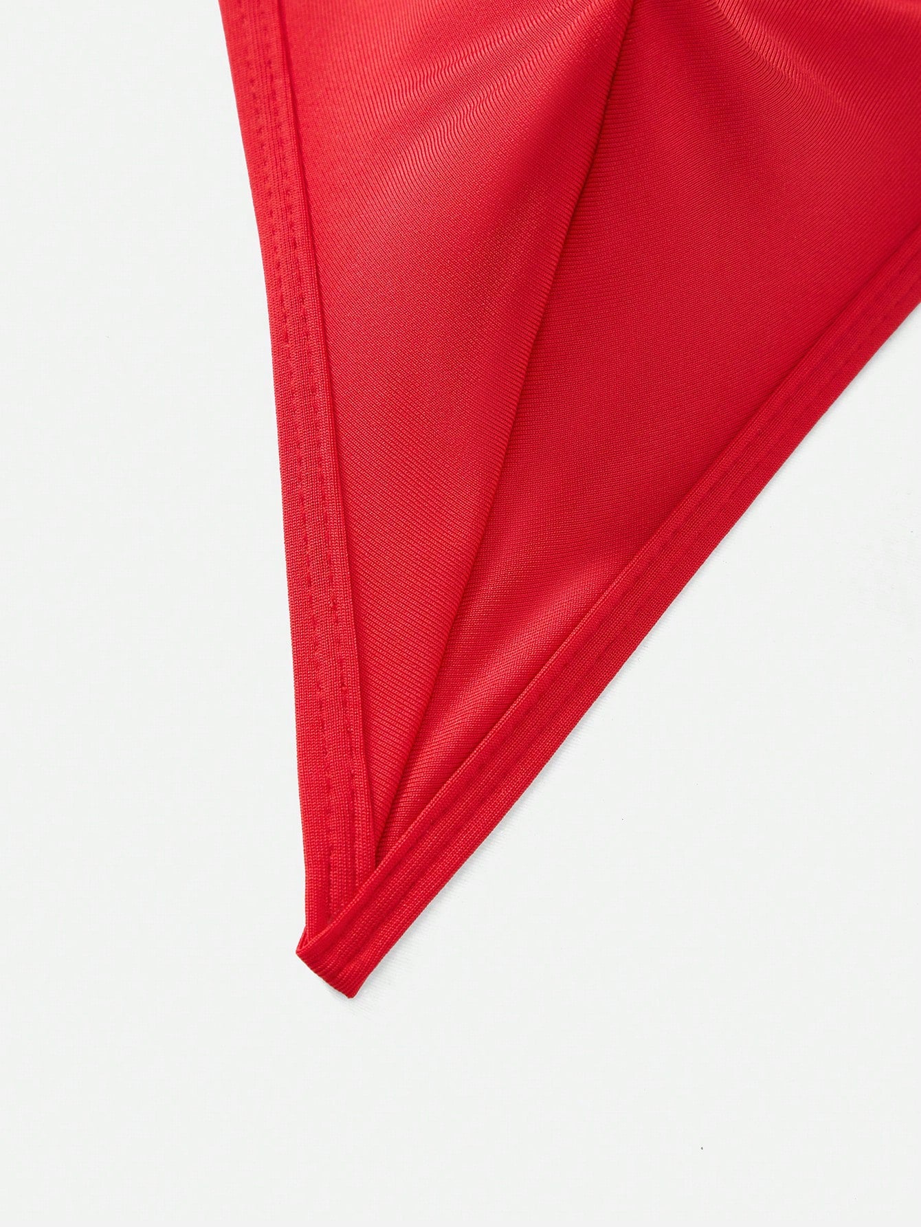 Men's red low-rise thong underwear with metal decor, plain high-stretch knitted fabric, unlined and non-sheer