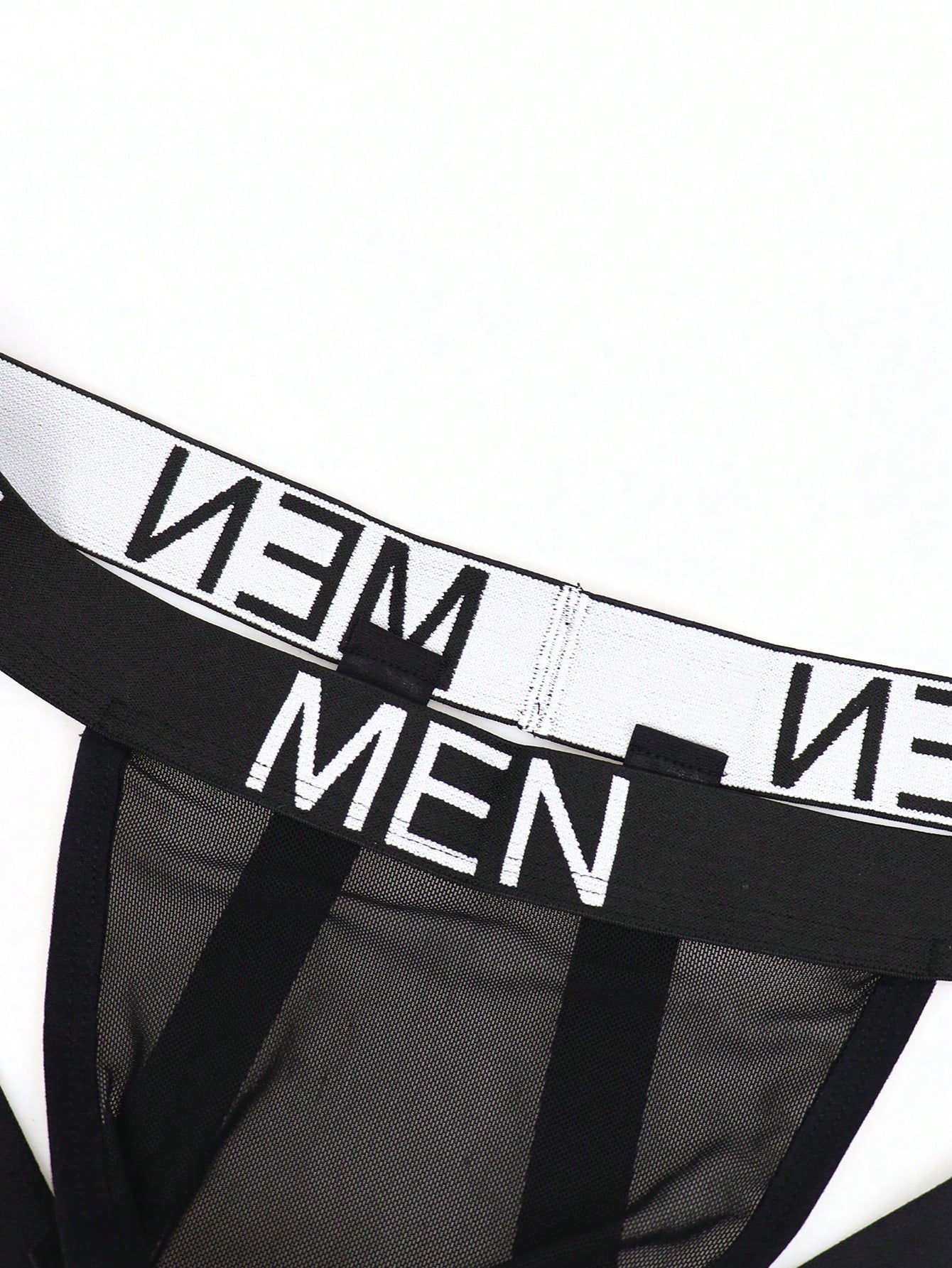 Men's black low-rise jockstrap briefs made from striped mesh fabric with a slim fit design
