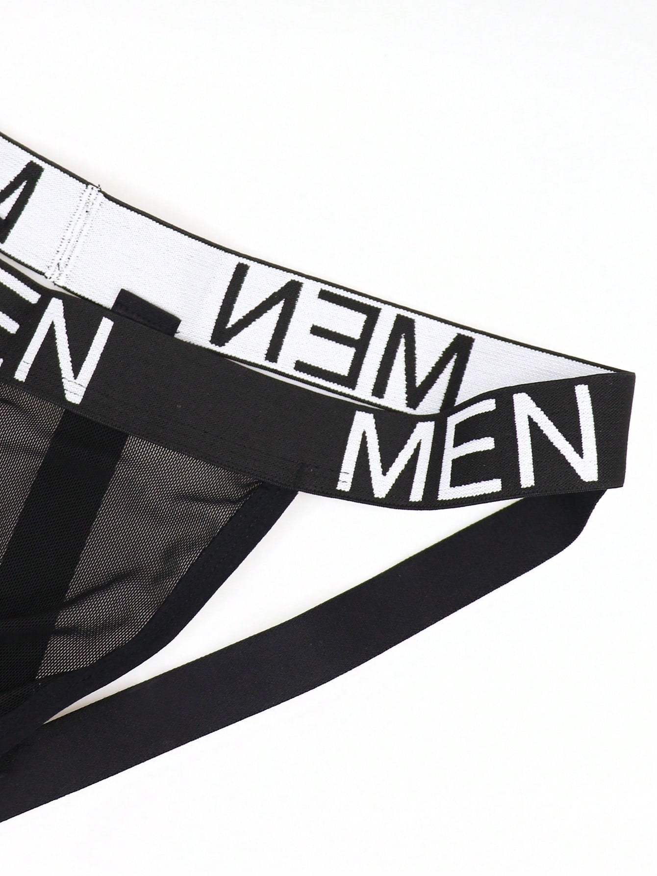 Men's black low-rise jockstrap briefs made from striped mesh fabric with a slim fit design