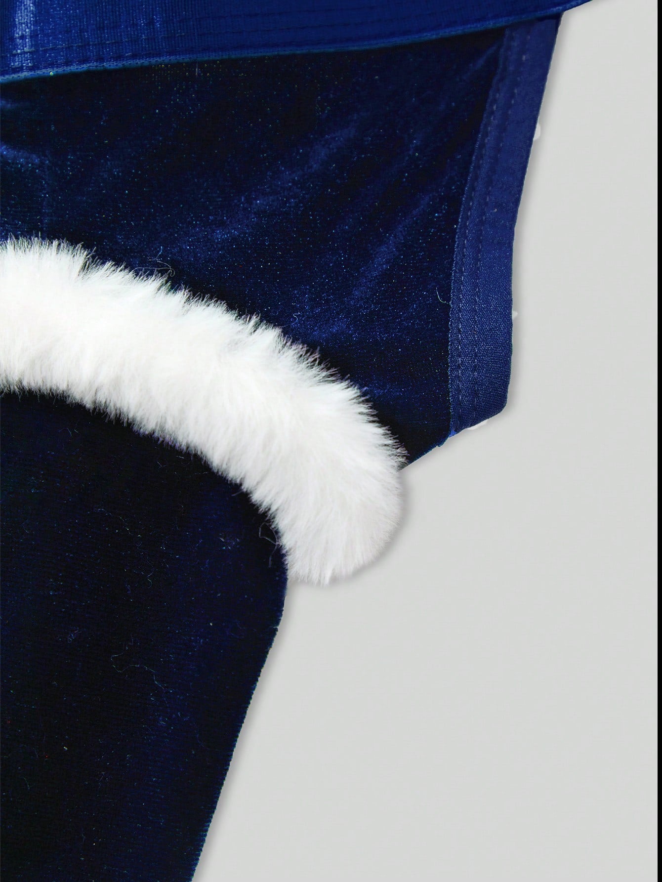 Men's Christmas pom-pom low-rise jockstrap with colorblock styling, designed for party wear