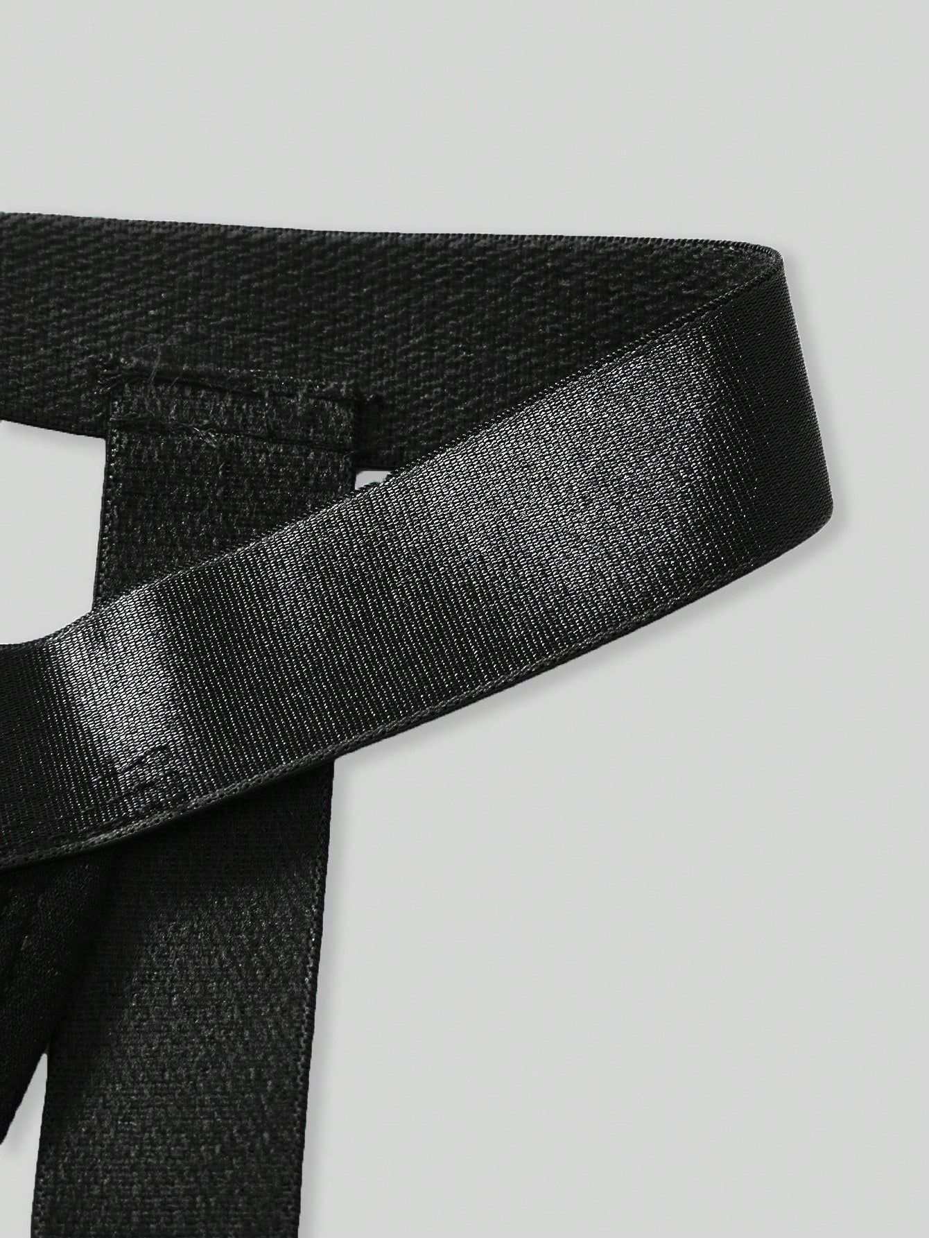 Men's Christmas pom-pom low-rise jockstrap with colorblock styling, designed for party wear