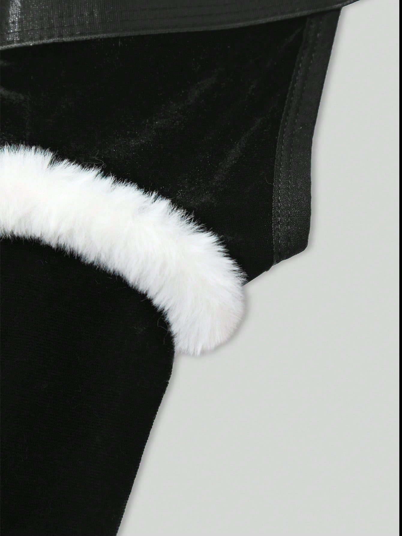 Men's Christmas pom-pom low-rise jockstrap with colorblock styling, designed for party wear