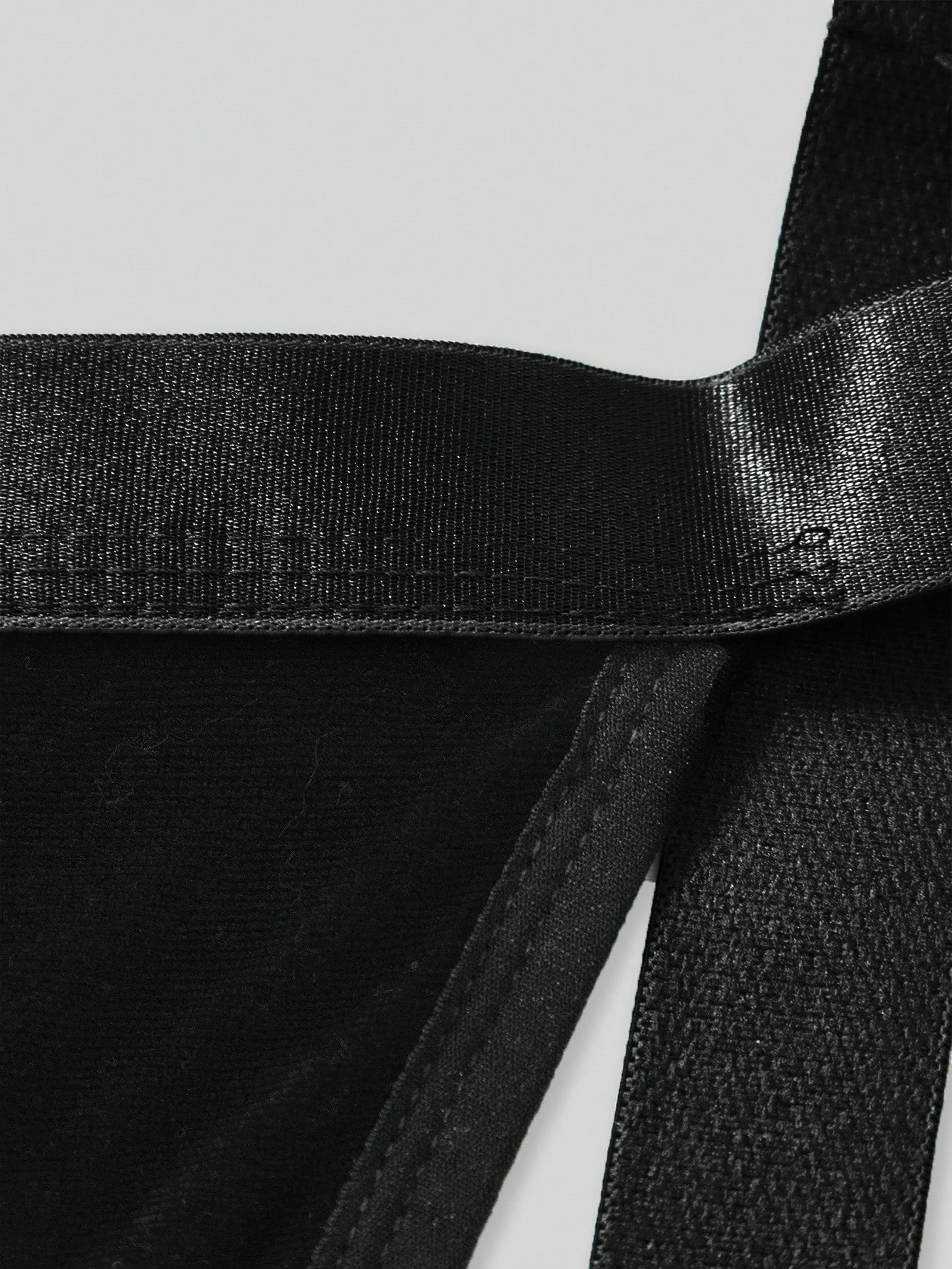 Men's Christmas pom-pom low-rise jockstrap with colorblock styling, designed for party wear