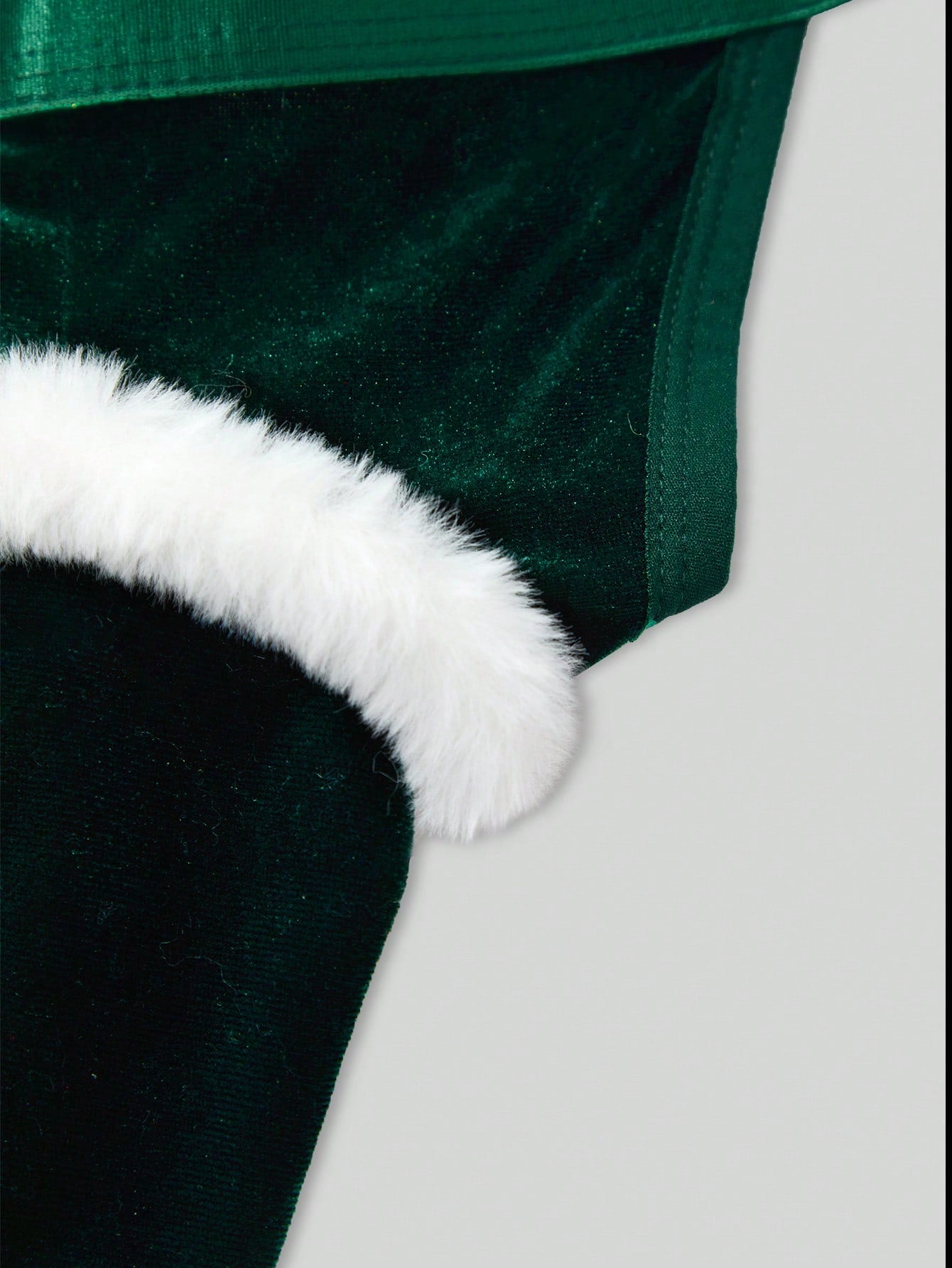 Men's Christmas pom-pom low-rise jockstrap with colorblock styling, designed for party wear