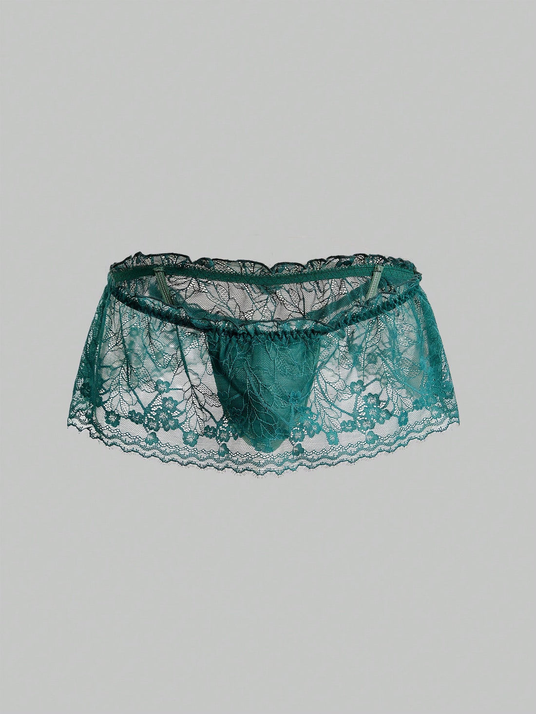 Men's dark green low-rise thong underwear with contrast lace, semi-sheer detailing, and random print design.