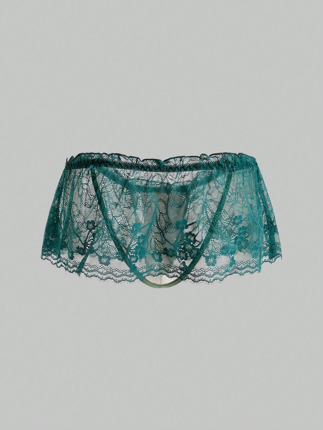 Men's dark green low-rise thong underwear with contrast lace, semi-sheer detailing, and random print design.
