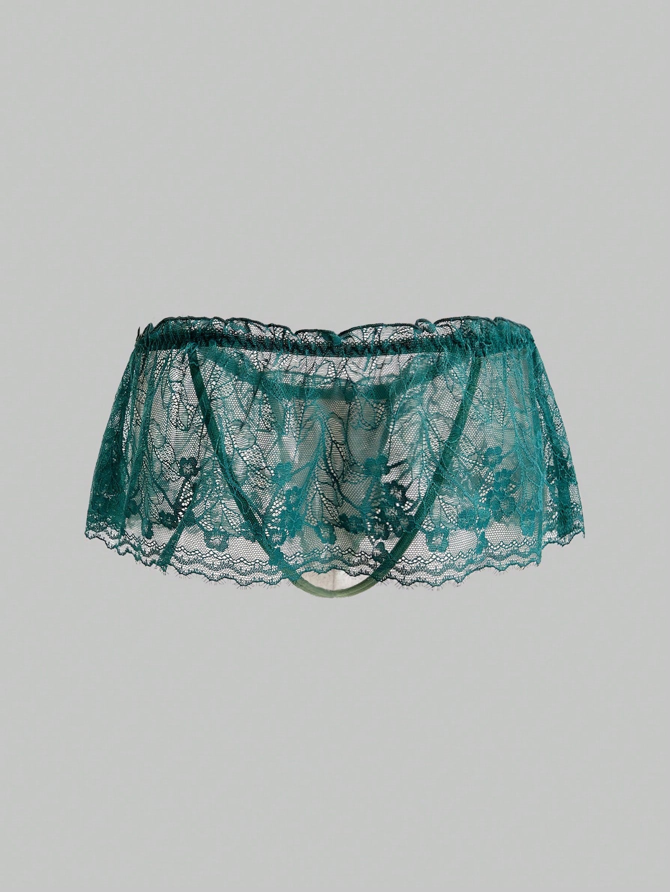 Men's dark green low-rise thong underwear with contrast lace, semi-sheer detailing, and random print design.