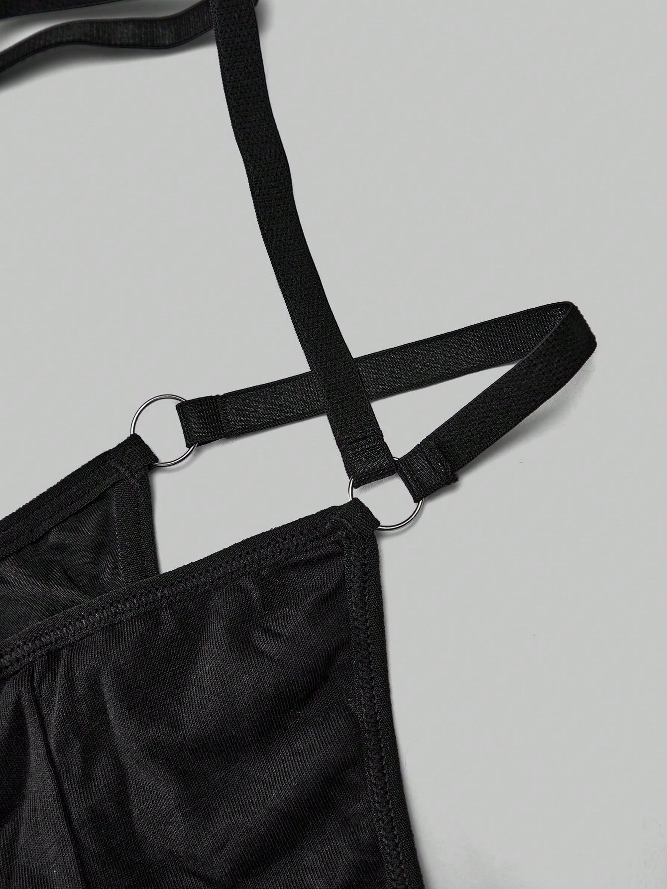 Men's black Valentine's Day costume jumpsuit with spaghetti straps, cut-out backless details, and matching arm sleeves