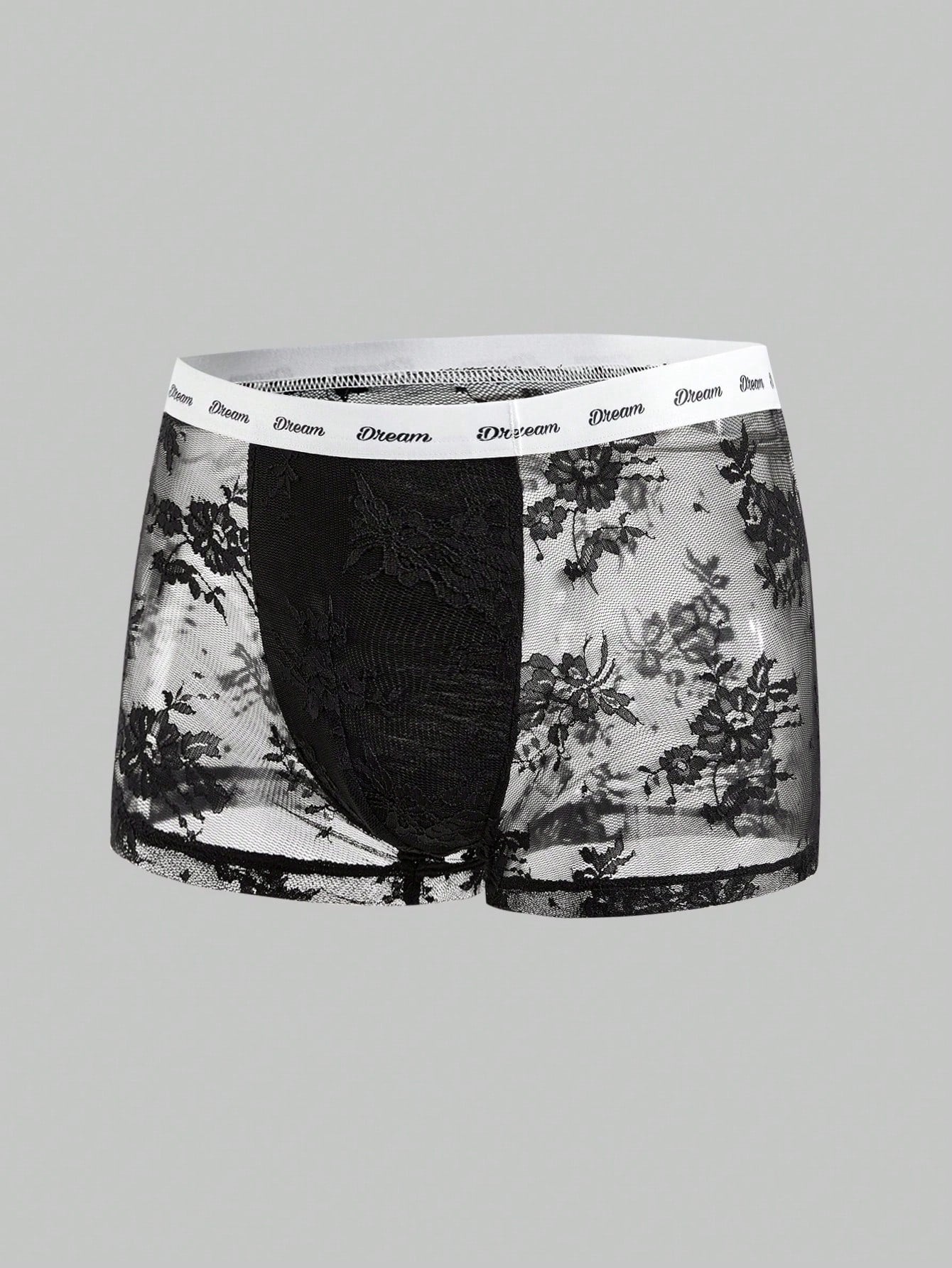 Men's black and white lace trim briefs with tape details and letter and plant pattern, shown as a short regular-fit underwear style.