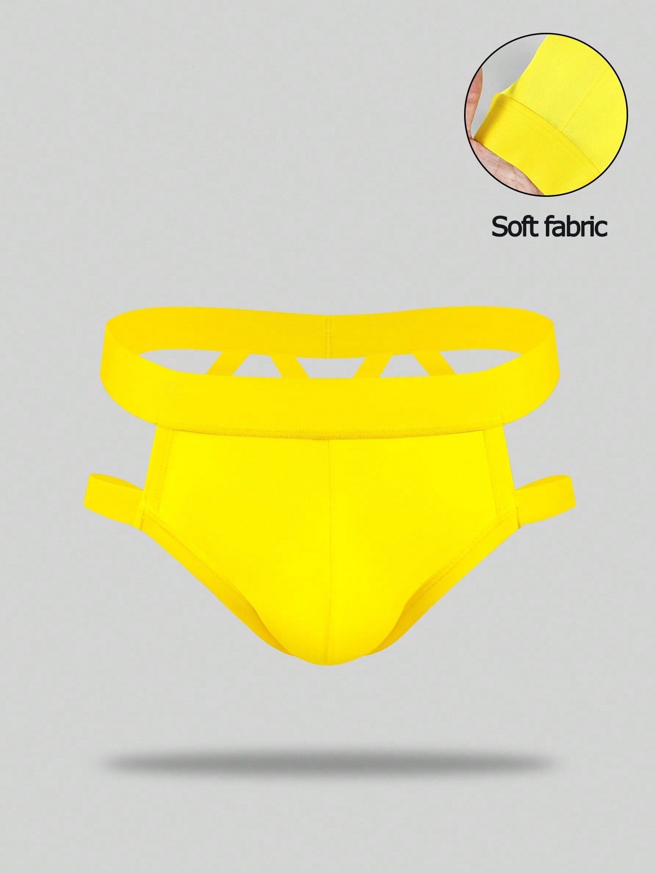 Men's low rise jockstrap underwear with cut out detail and colorblock design in medium-stretch knitted fabric