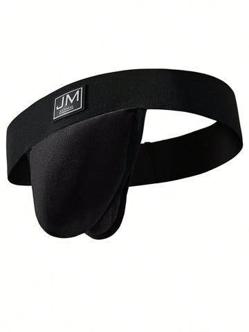 Men's black low-rise thong underwear with wide waistband and letter pattern, made from medium-stretch fabric.