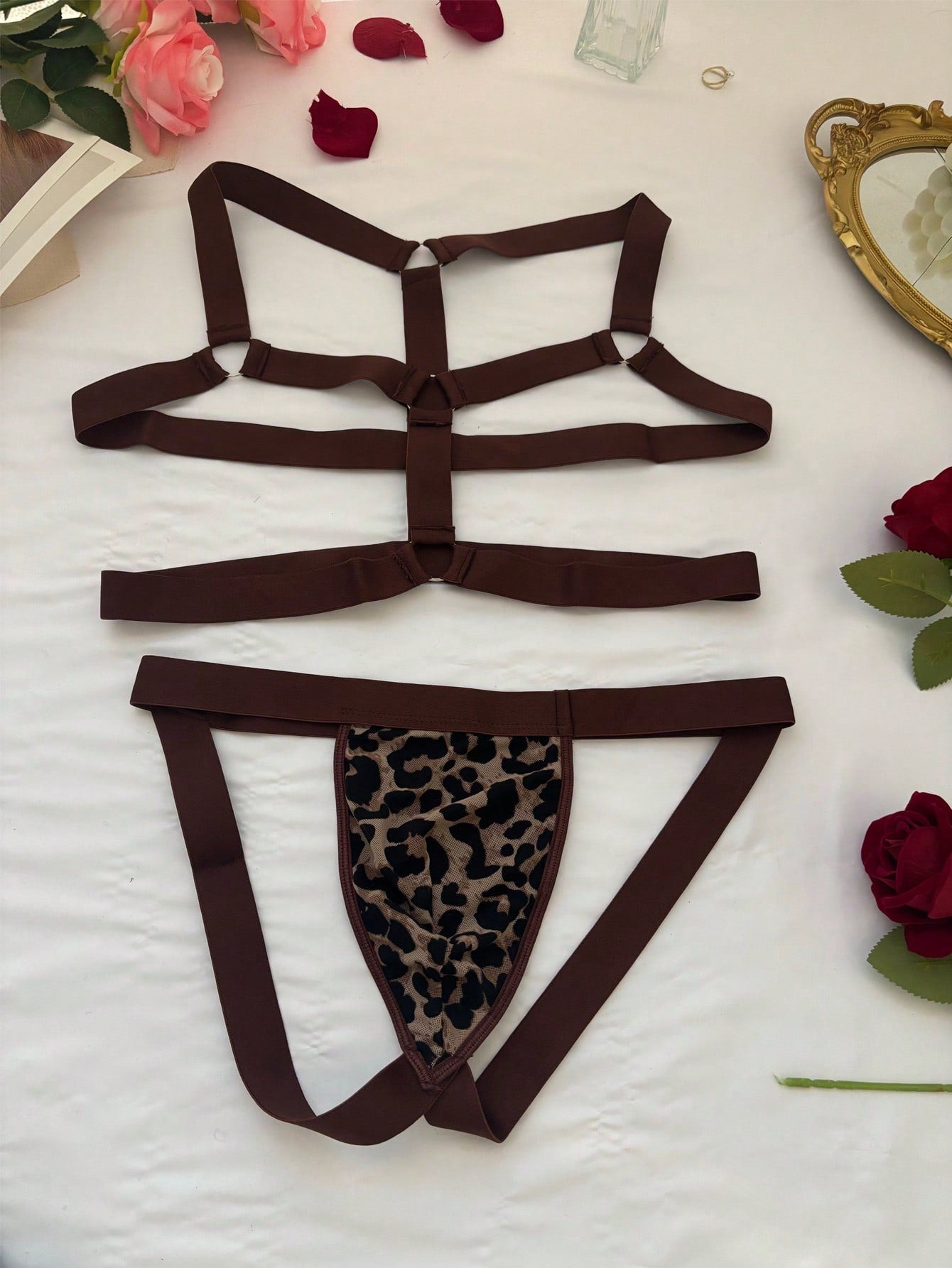 Men's leopard print mesh lingerie set with short vest, leopard tape details, knot accent, and low-rise thong.