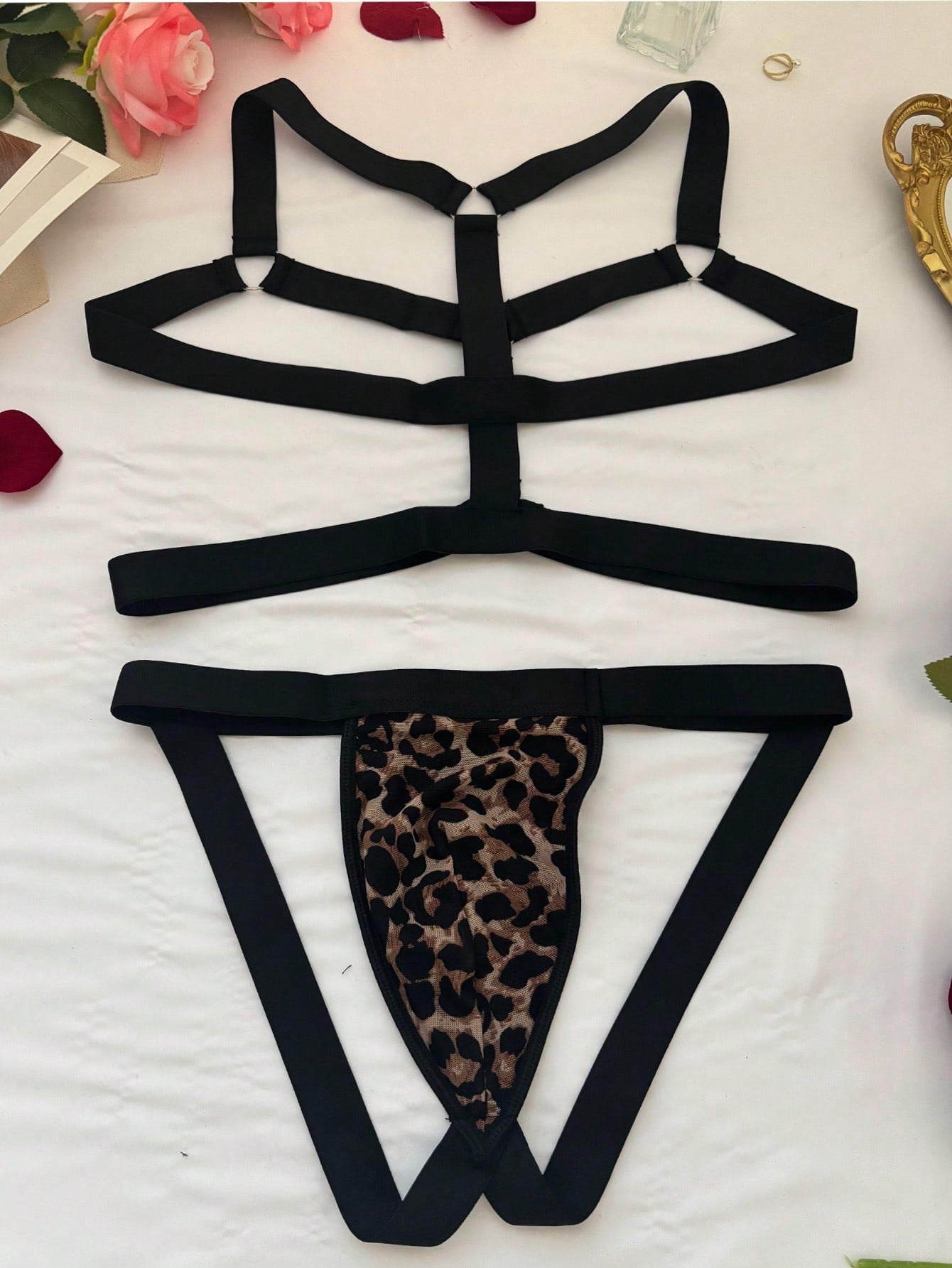Men's leopard print mesh lingerie set with short vest, leopard tape details, knot accent, and low-rise thong.