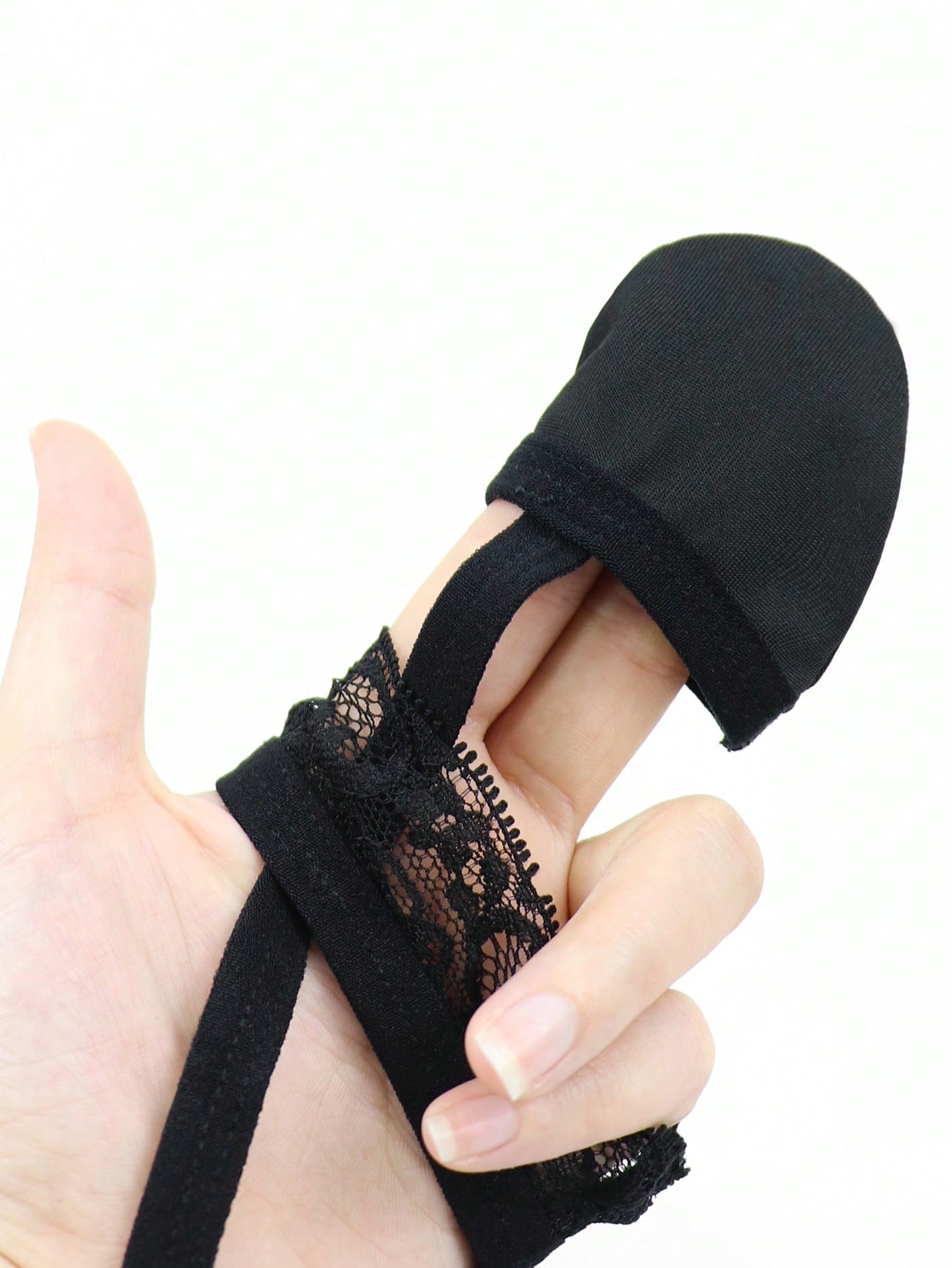 Black slim fit men's thong with lace waist detail and colorblock design