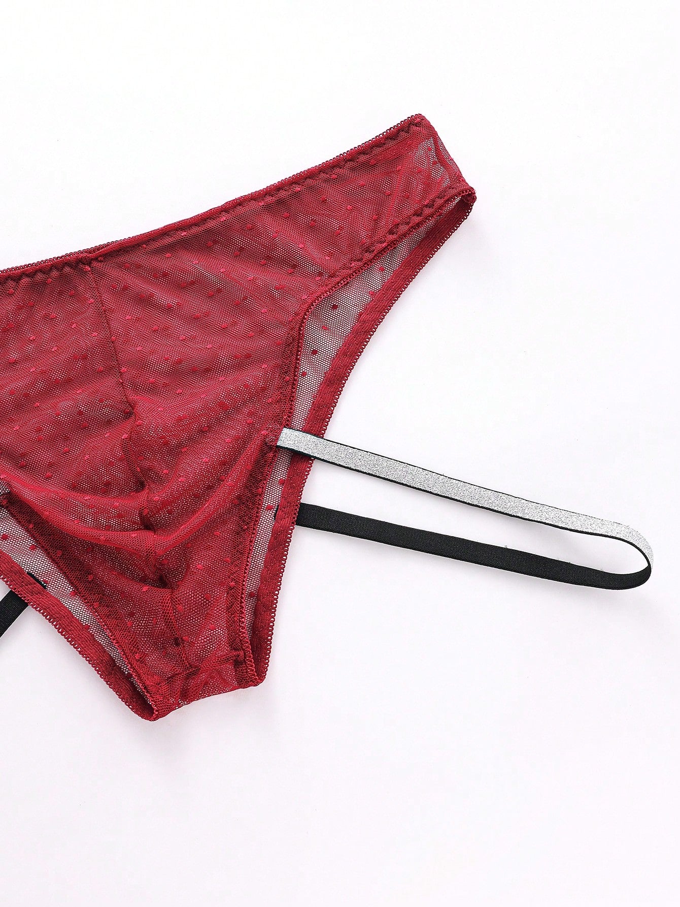 Men's burgundy low-rise lace trim briefs with a geometric pattern and semi-sheer knitted fabric