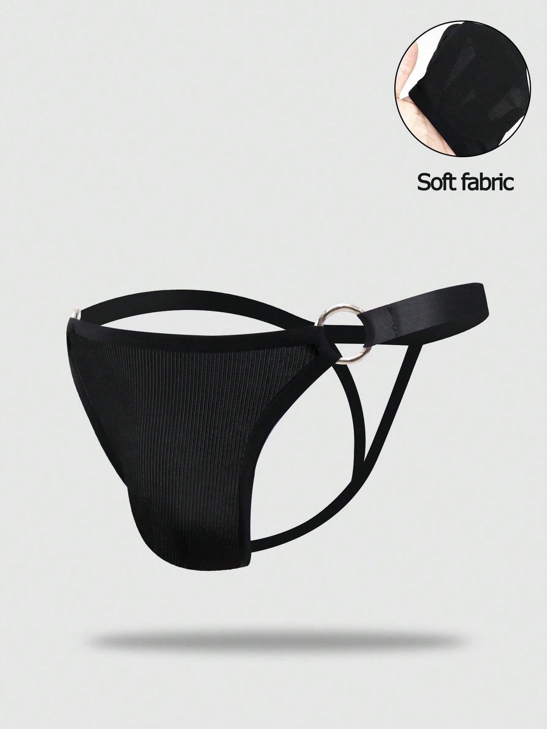 Men's low-rise thong underwear with plain cut-out design in medium-stretch knitted fabric.