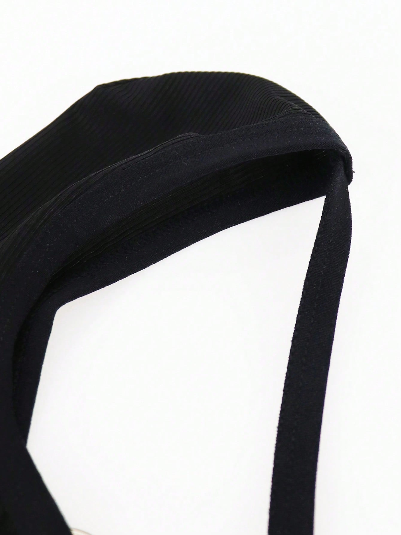Men's low-rise thong underwear with plain cut-out design in medium-stretch knitted fabric.