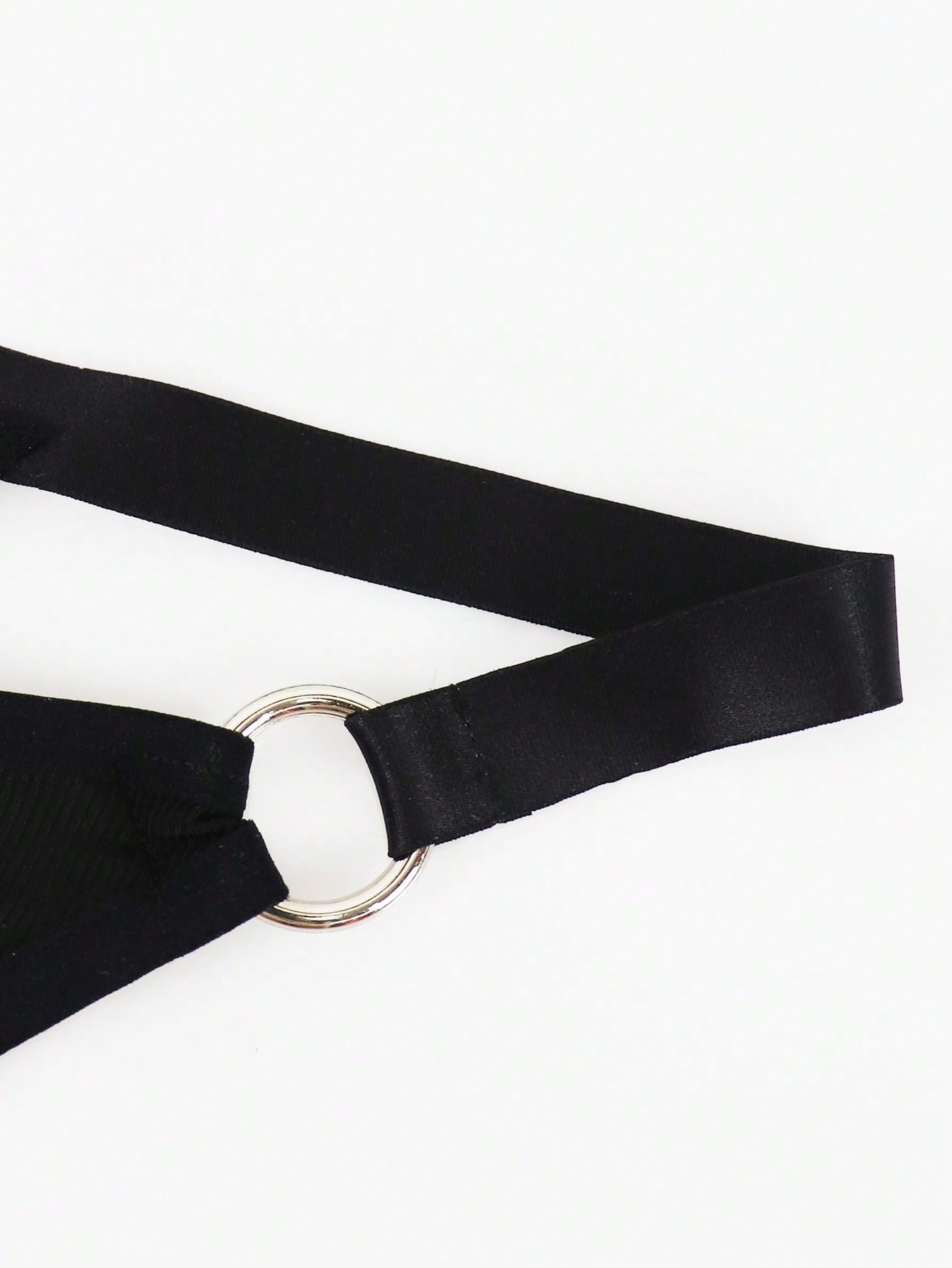 Men's low-rise thong underwear with plain cut-out design in medium-stretch knitted fabric.