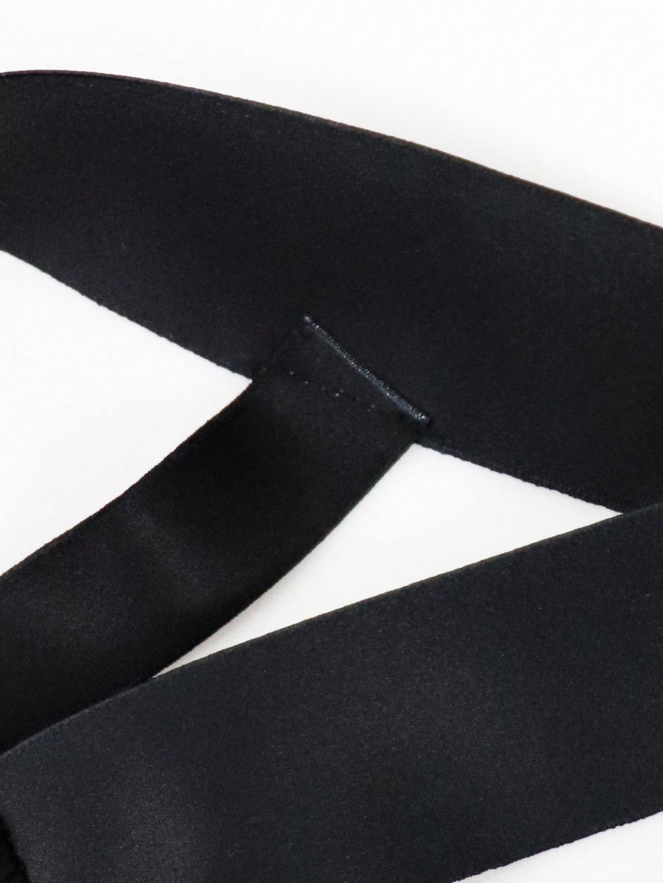 Men's solid color hollow breathable jockstrap underwear with a low-rise brief-style front and minimalist design