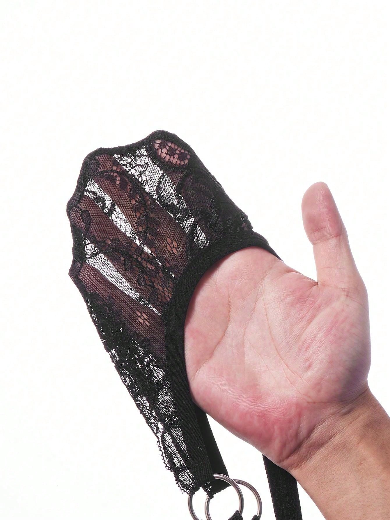 Men's black lace low-rise jockstrap thong with contrast lace, hollow-out details, and semi-sheer plain design