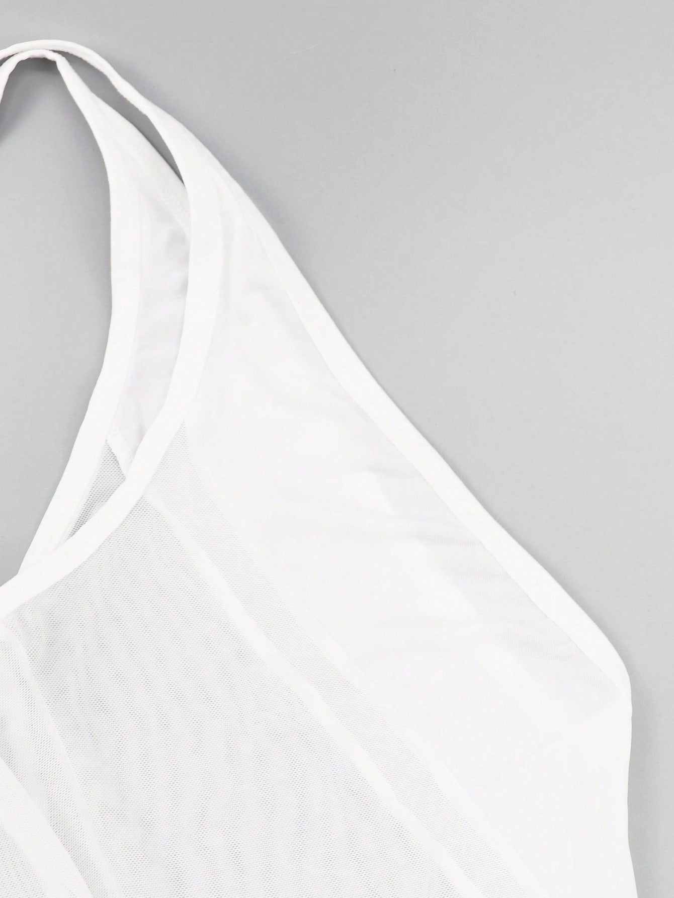 Men's white mesh thong underwear with deep V-neck, cut-out detail, plain design, and mid-rise fit.