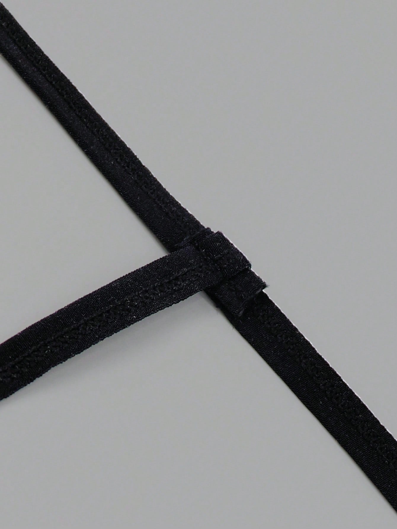 Men's low-rise mesh thong underwear with contrast lace waist, contrast binding, and colorblock design