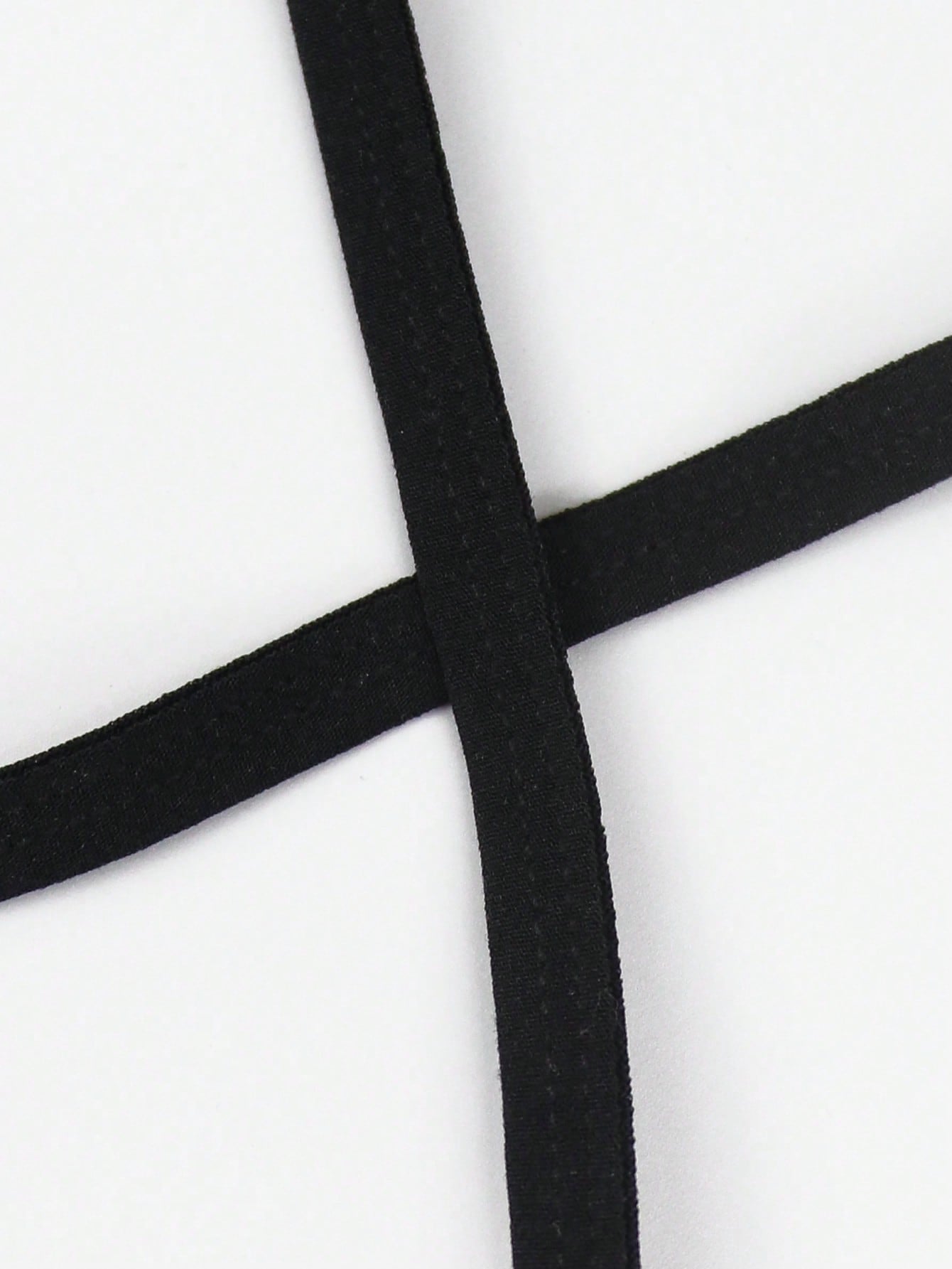Men's black colorblock low-rise thong underwear made from medium-stretch knitted fabric
