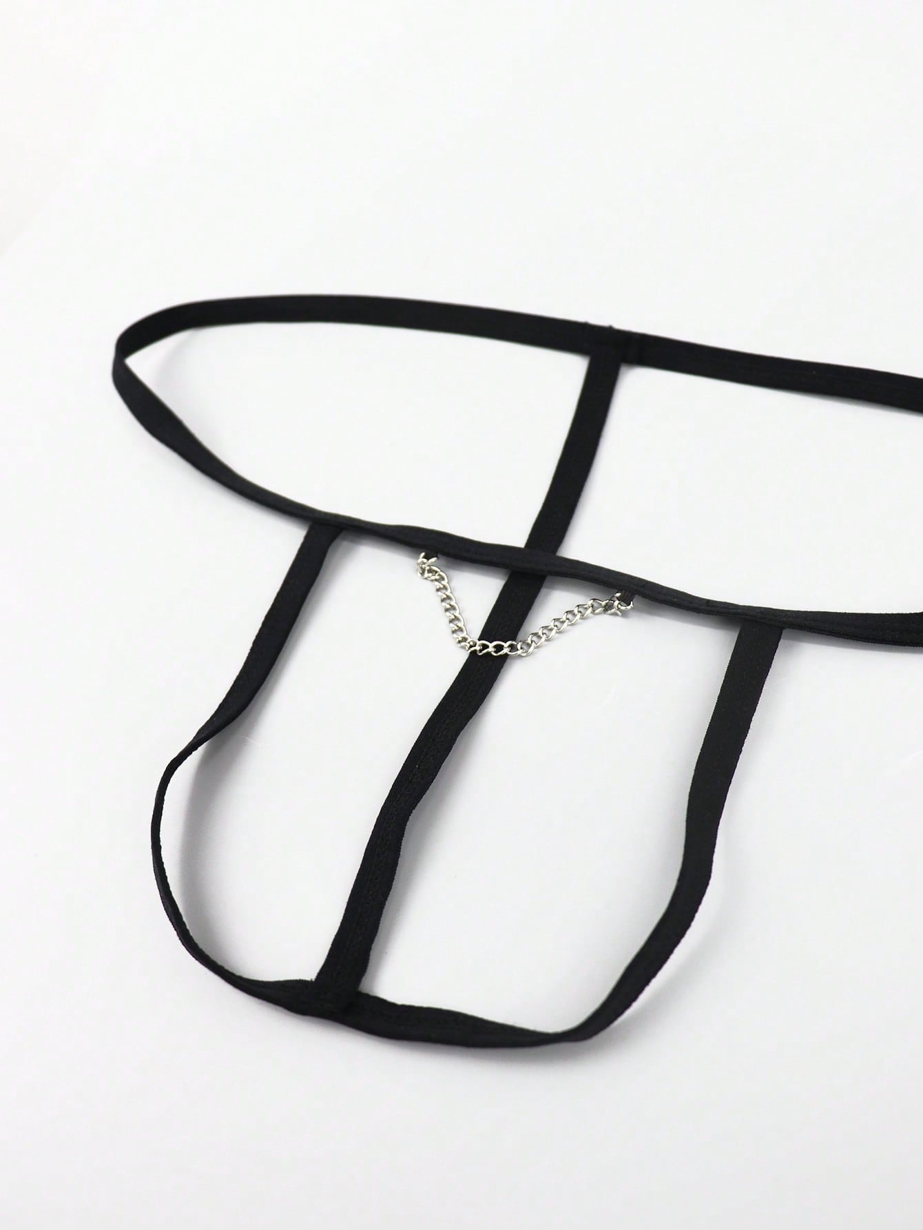Men's black colorblock low-rise thong underwear made from medium-stretch knitted fabric