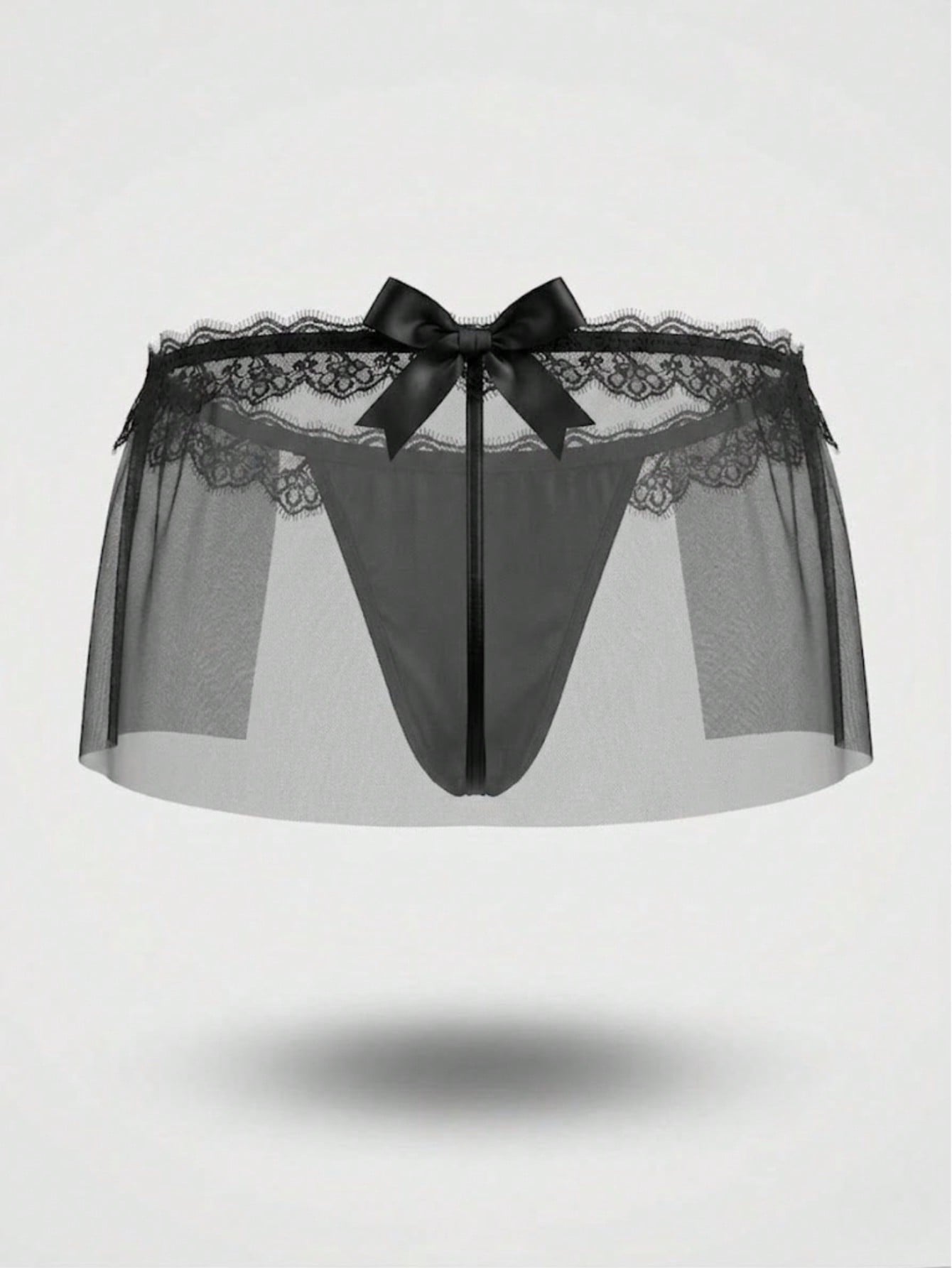 Men's black low-rise thong underwear with lace mesh styling, contrast lace, and bow detail