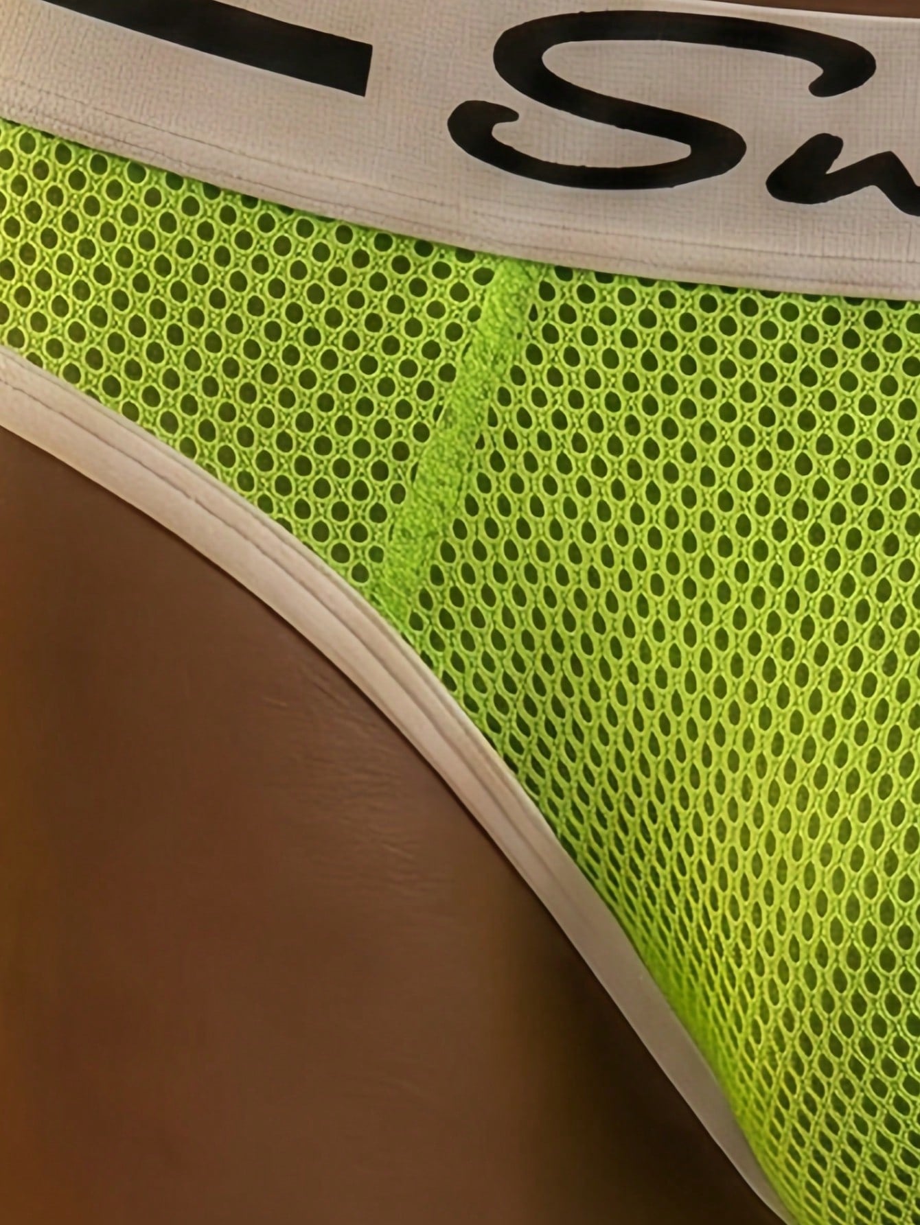 Men's contrast letter print mesh briefs with low-rise cut, tape detail, and contrast binding
