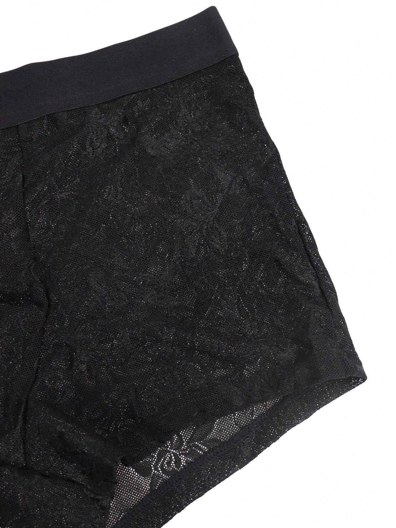 Men's black low-rise mesh boxer shorts with contrast lace details and a plain design