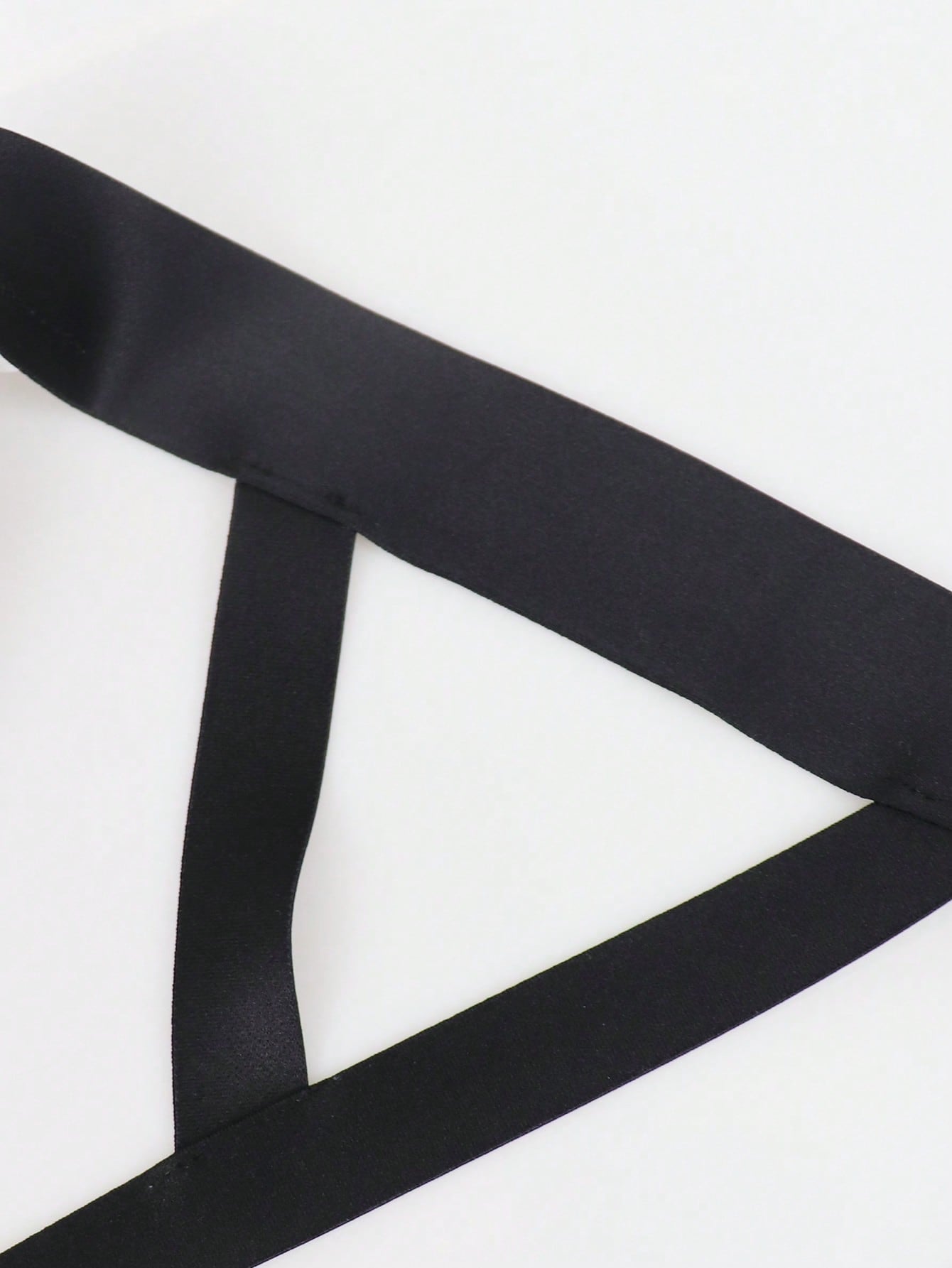 Men's solid color hollow breathable jockstrap underwear with a low-rise brief-style front and minimalist design