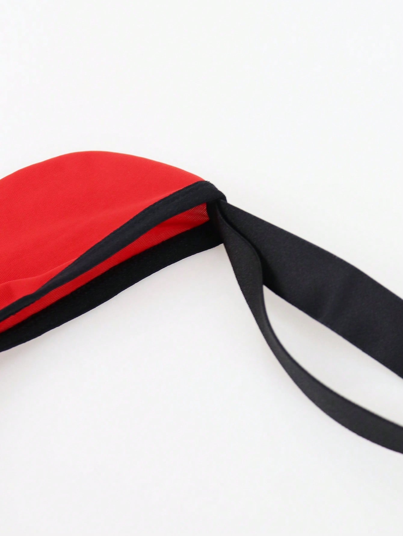 Men's solid color hollow breathable jockstrap underwear with a low-rise brief-style front and minimalist design