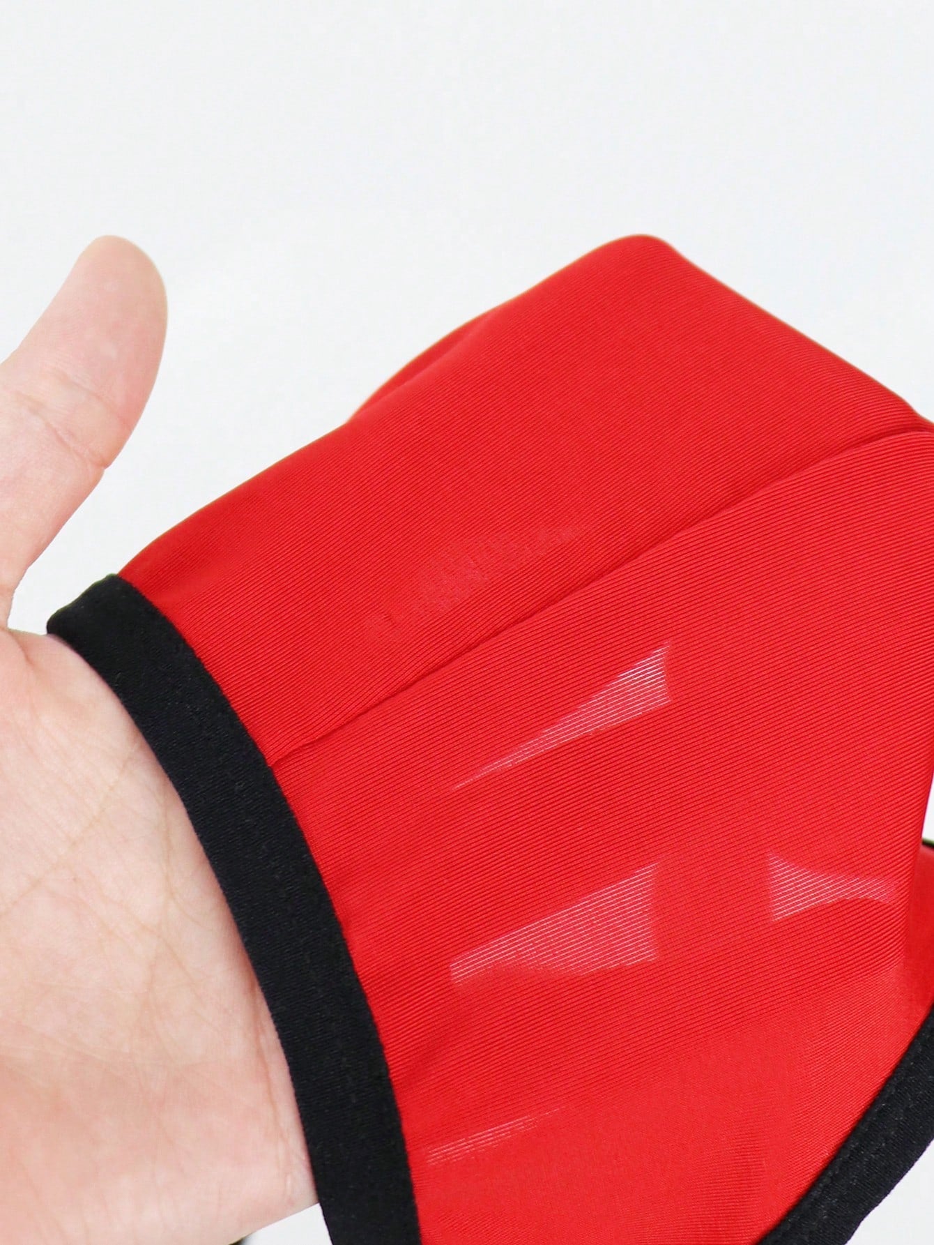 Men's solid color hollow breathable jockstrap underwear with a low-rise brief-style front and minimalist design