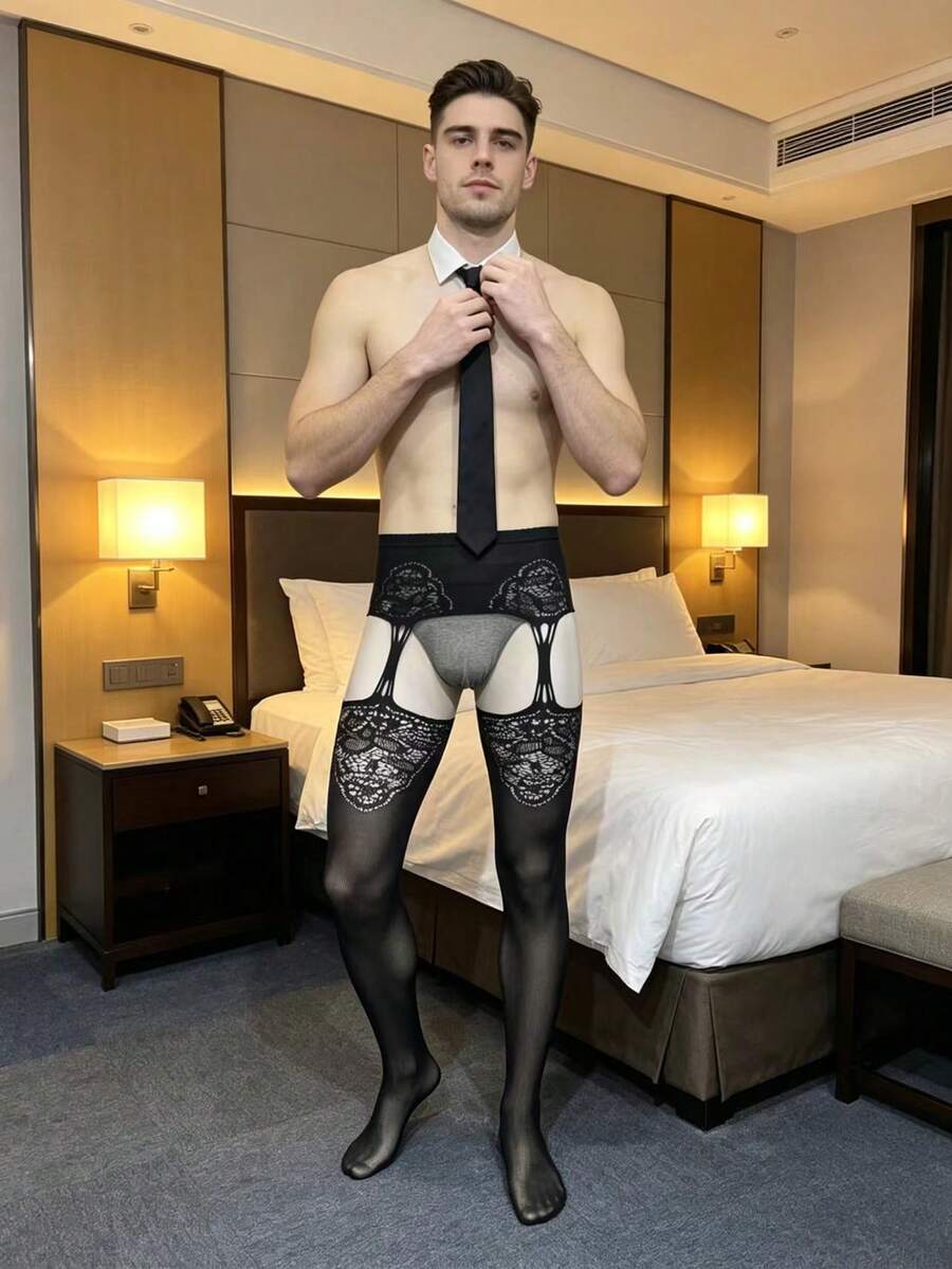 Men's black sheer fishnet hollow knit low-rise thong made from high-stretch knitted fabric.