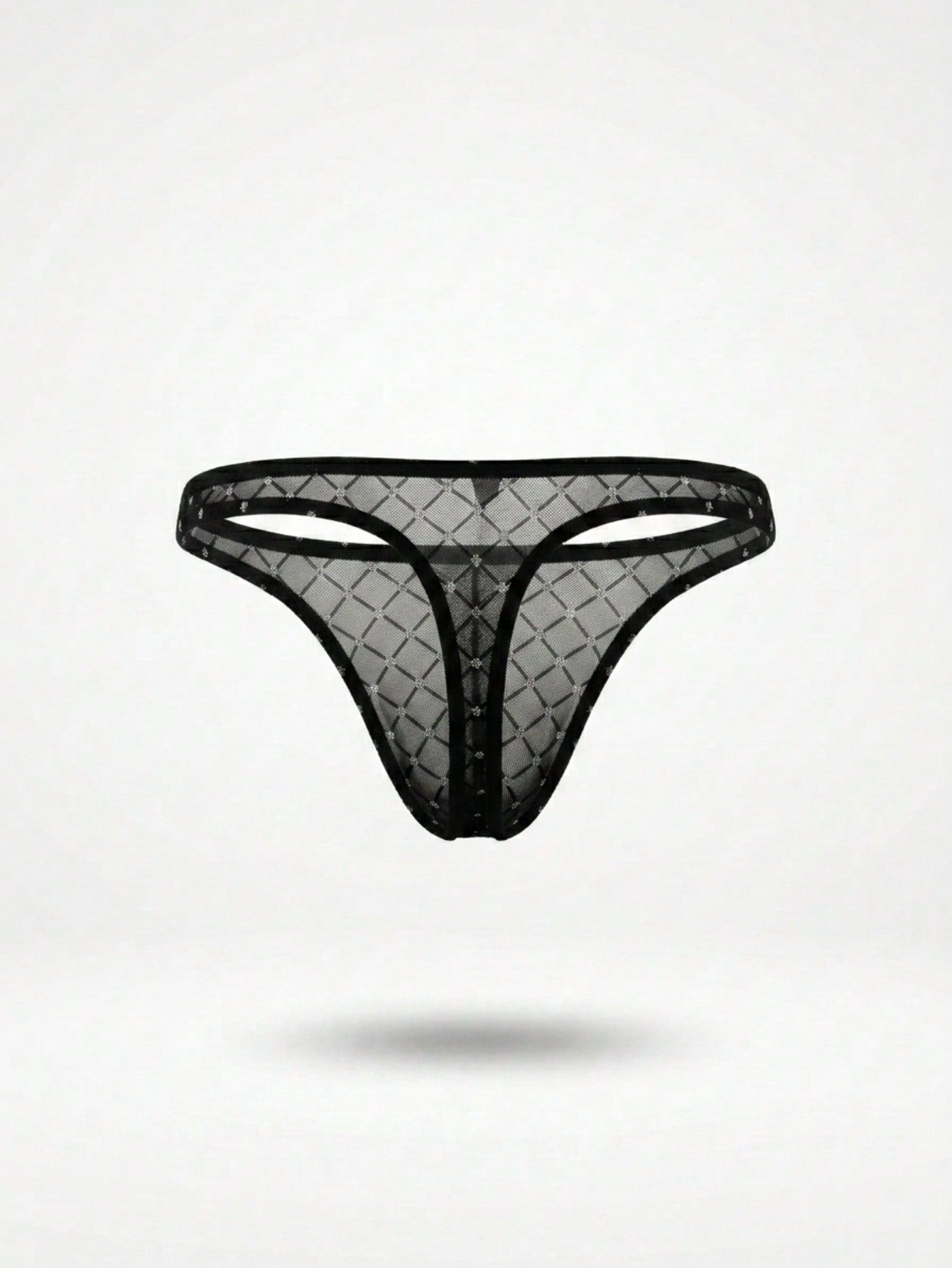 Men's black low rise thong with open rear T-back design, contrast mesh details, and plaid pattern